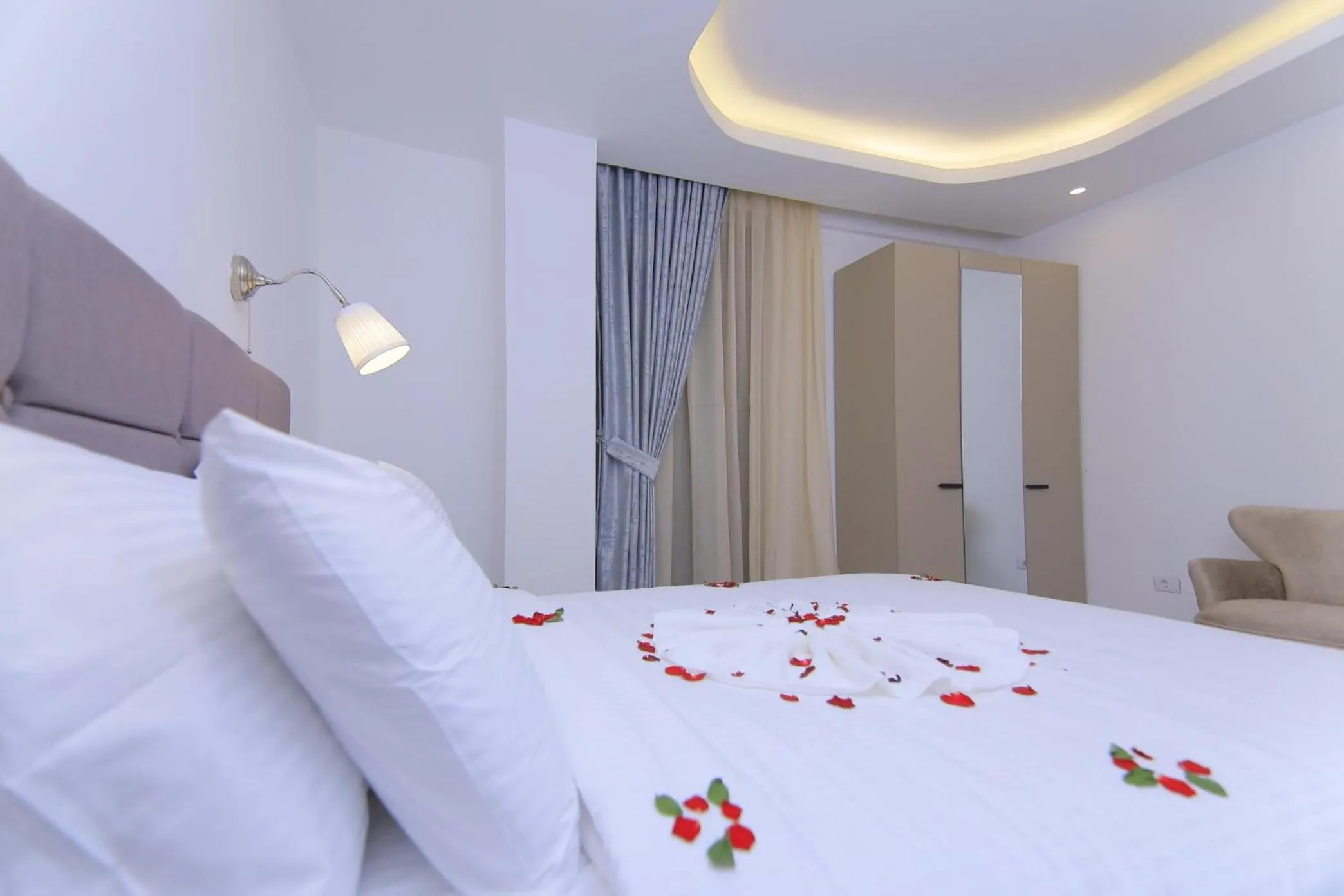 Bed in Zemilo Hotel Apartment