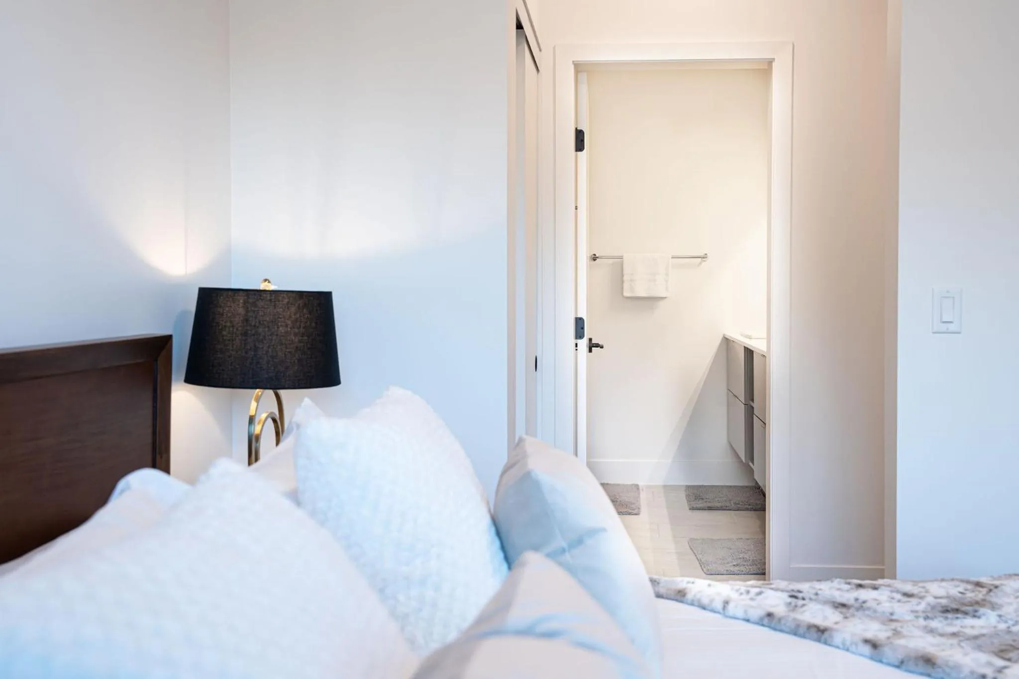 Bed in Mountainside Revival by Revelstoke Vacations