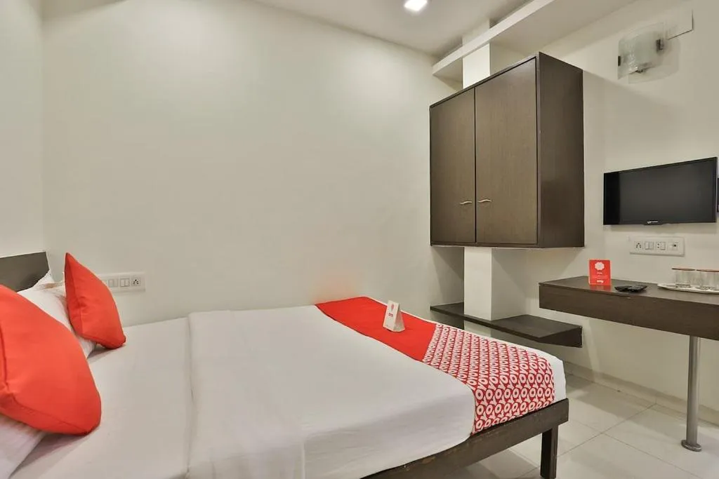 Bed in Hotel Isher International