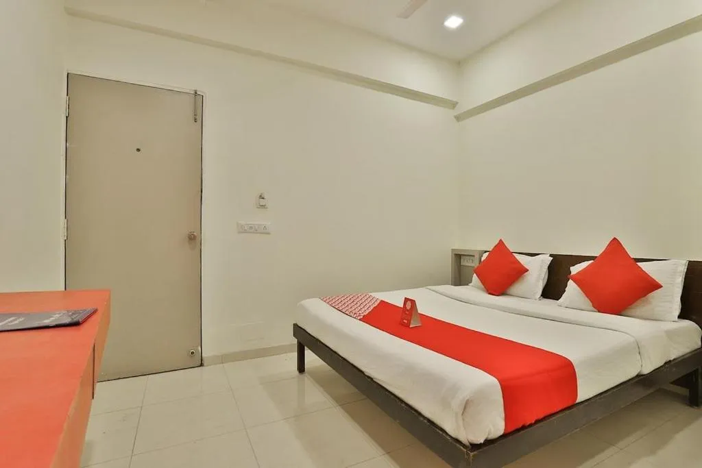 Bed in Hotel Isher International