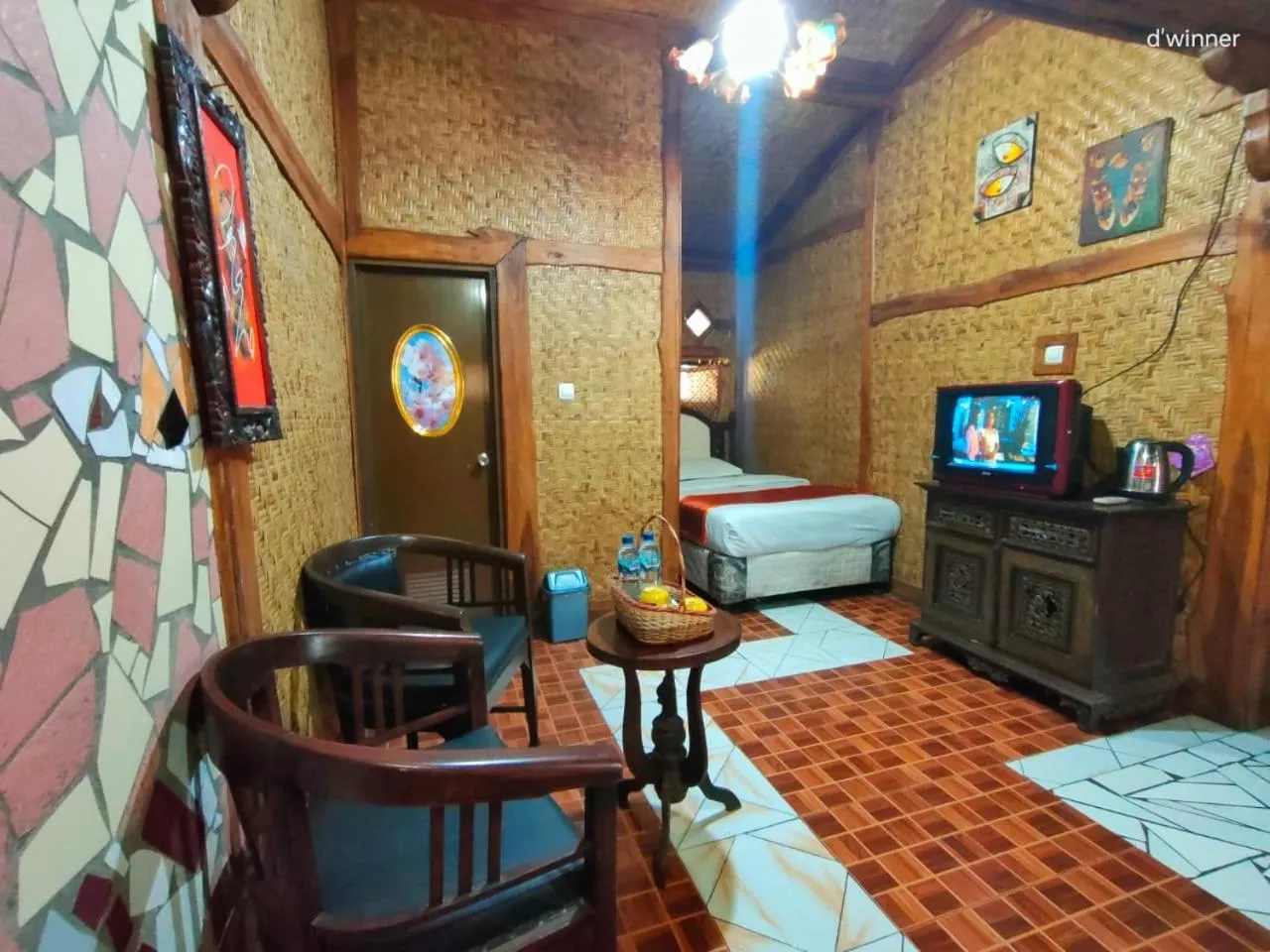 Bed in Yoschi's Hotel Bromo