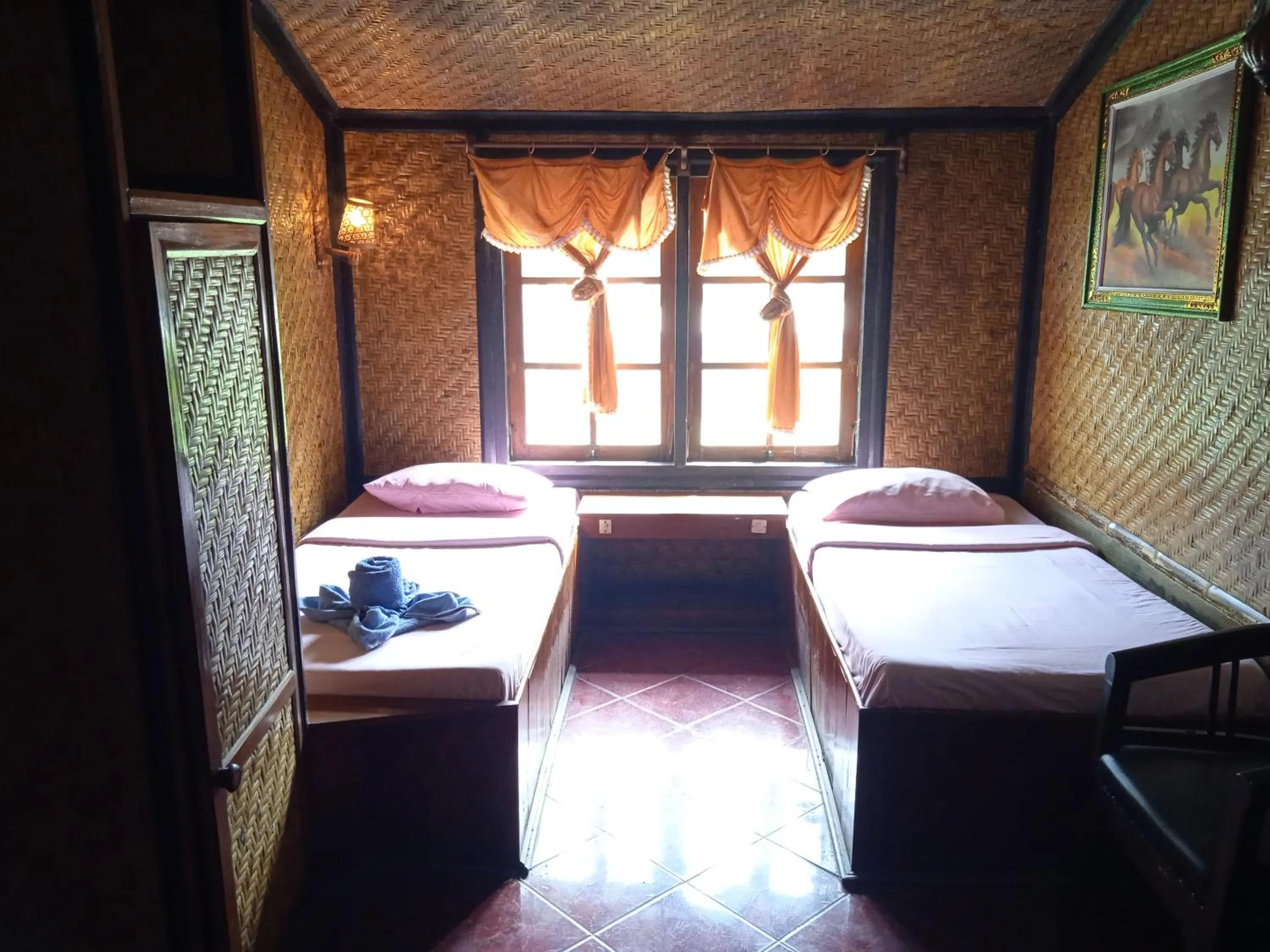 Bed in Yoschi's Hotel Bromo