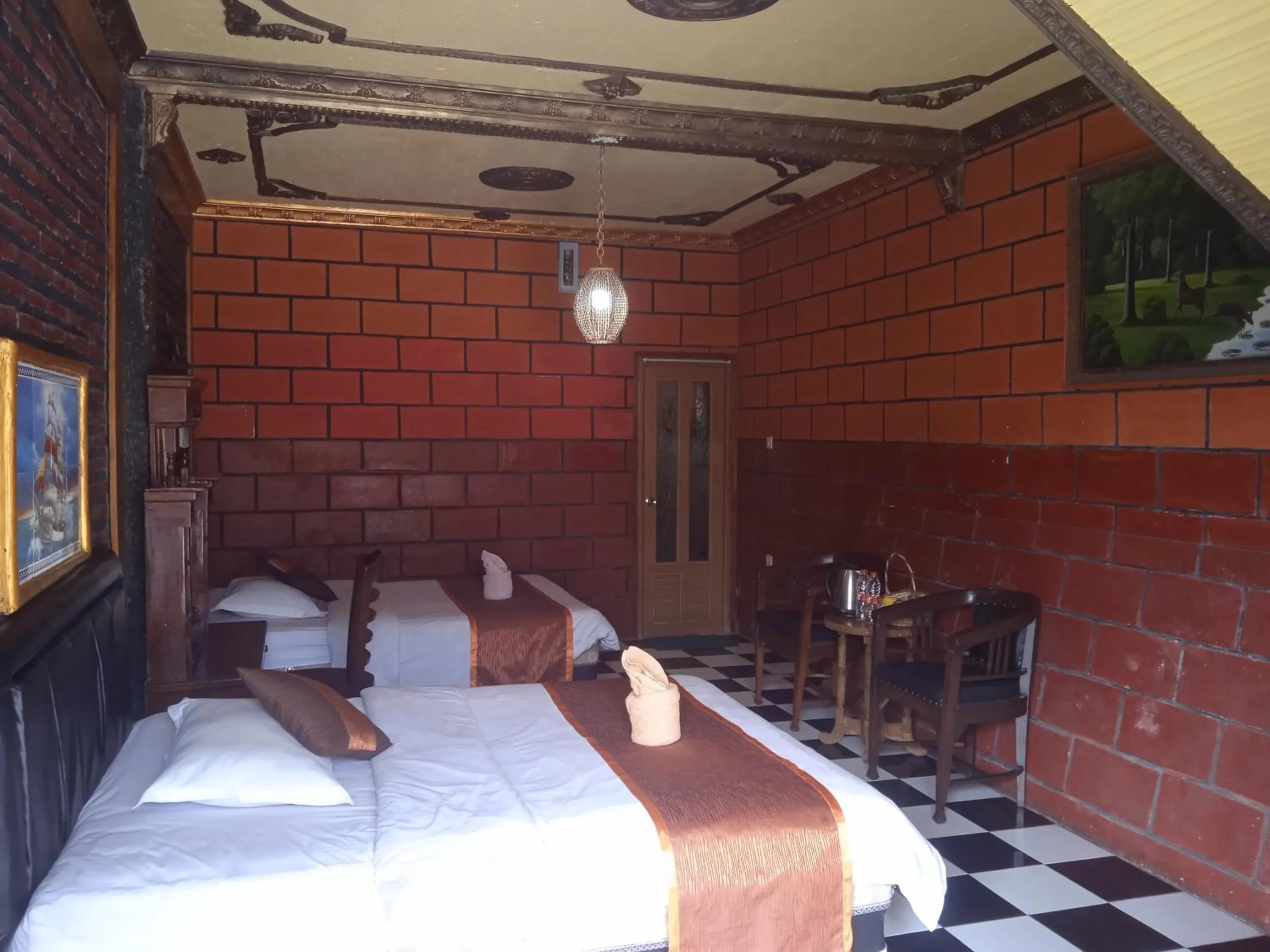 Bed in Yoschi's Hotel Bromo