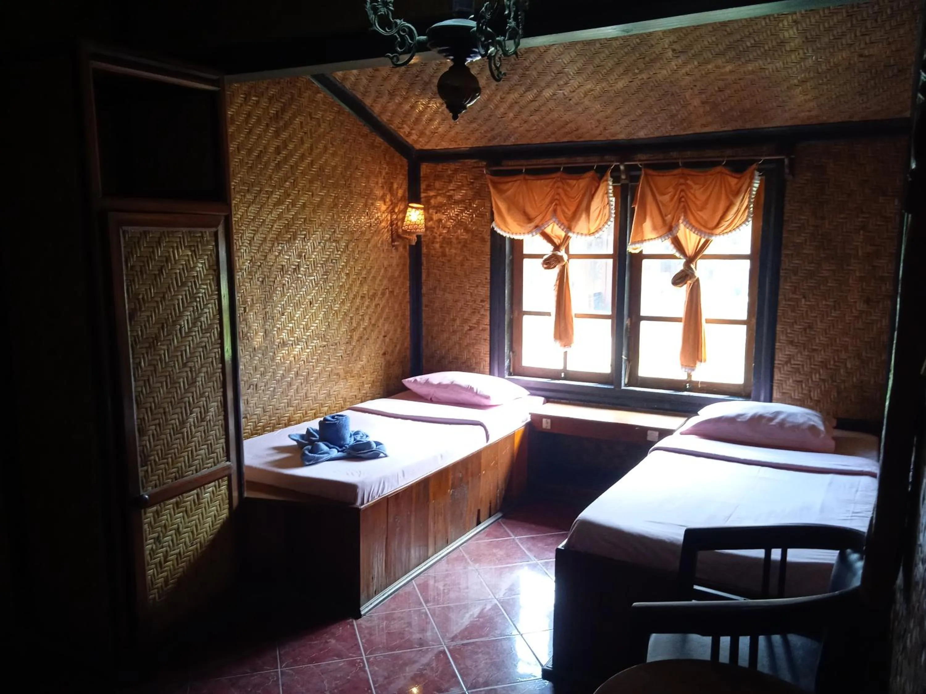 Bed in Yoschi's Hotel Bromo