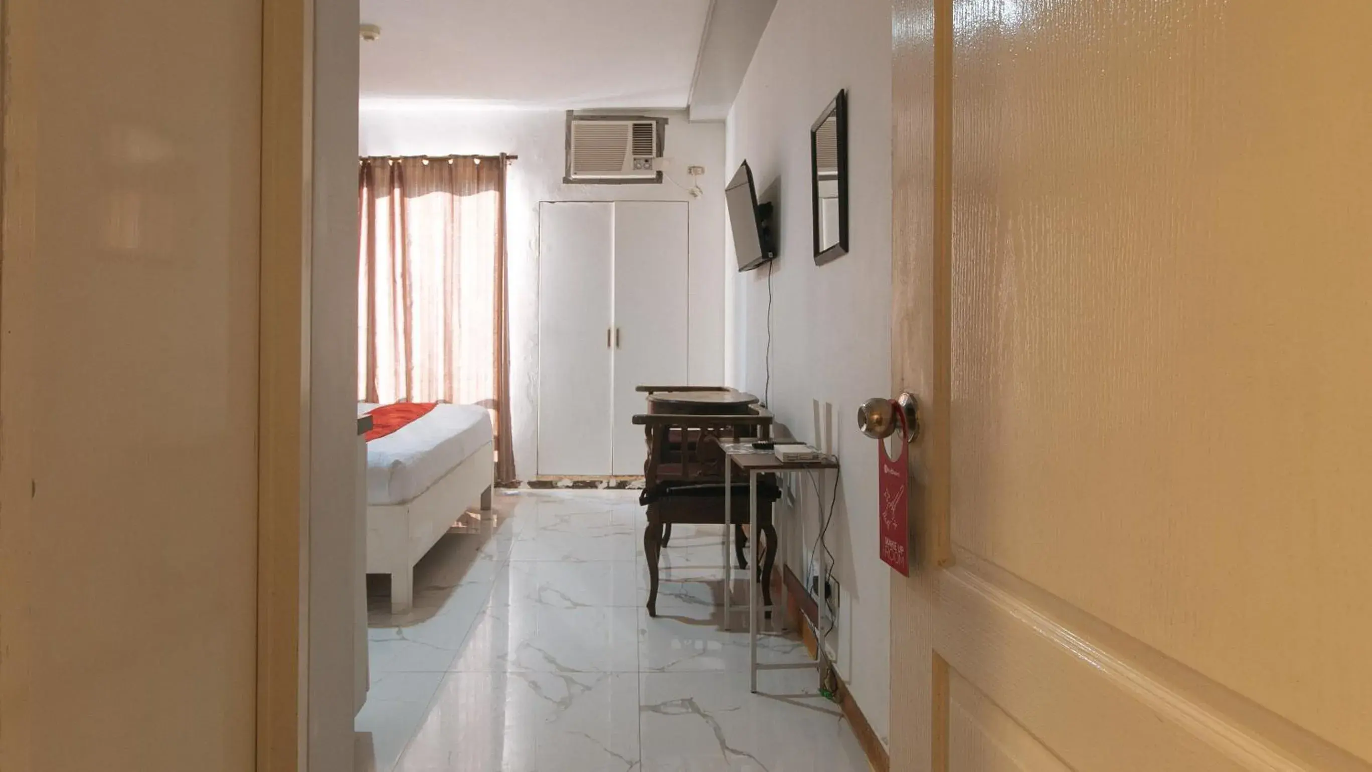 Bed in RedDoorz at TJMG by Bel Air Polaris Makati Bed in RedDoorz at TJMG by Bel Air Polaris Makati