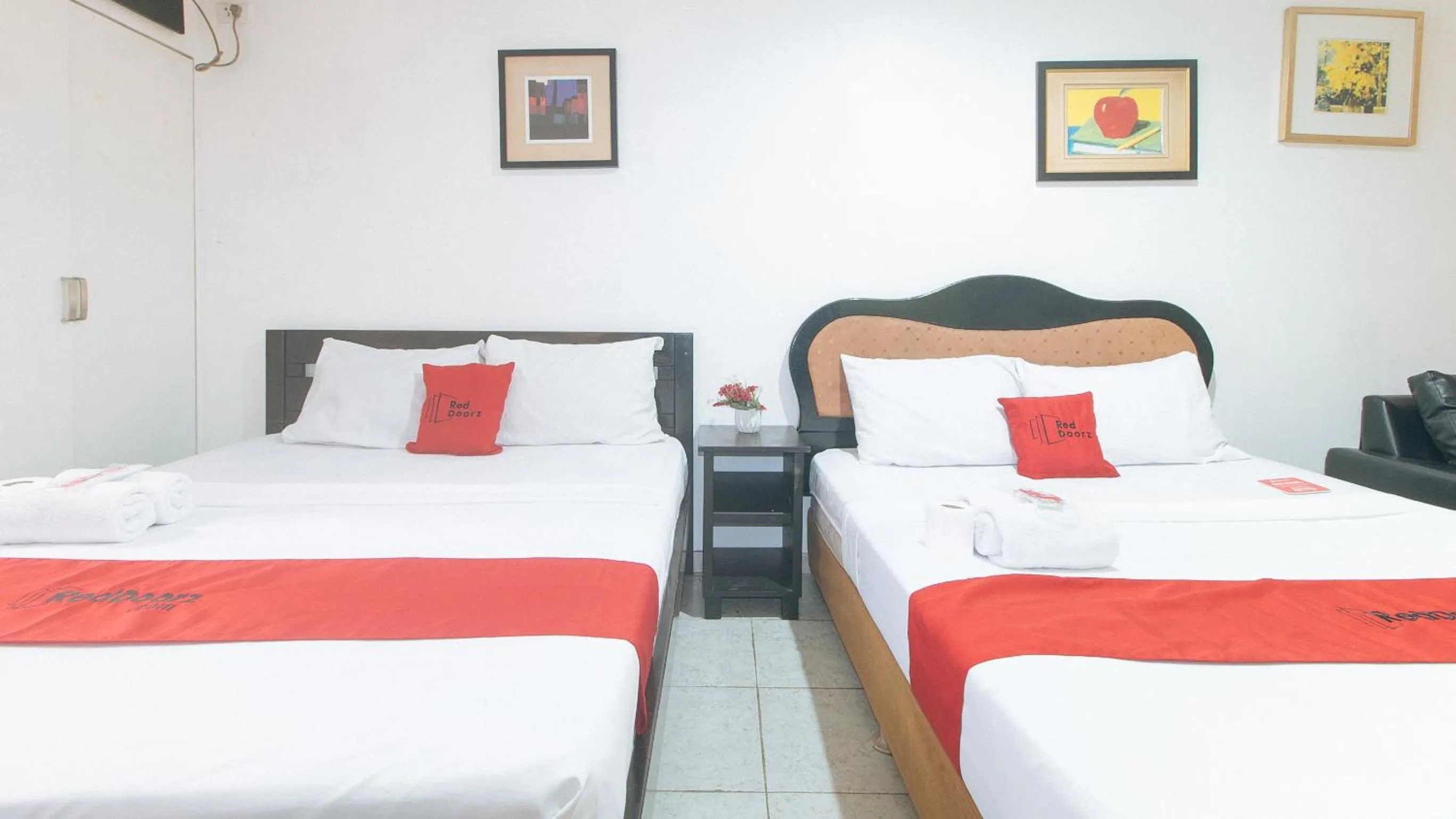 Bed in RedDoorz at TJMG by Bel Air Polaris Makati