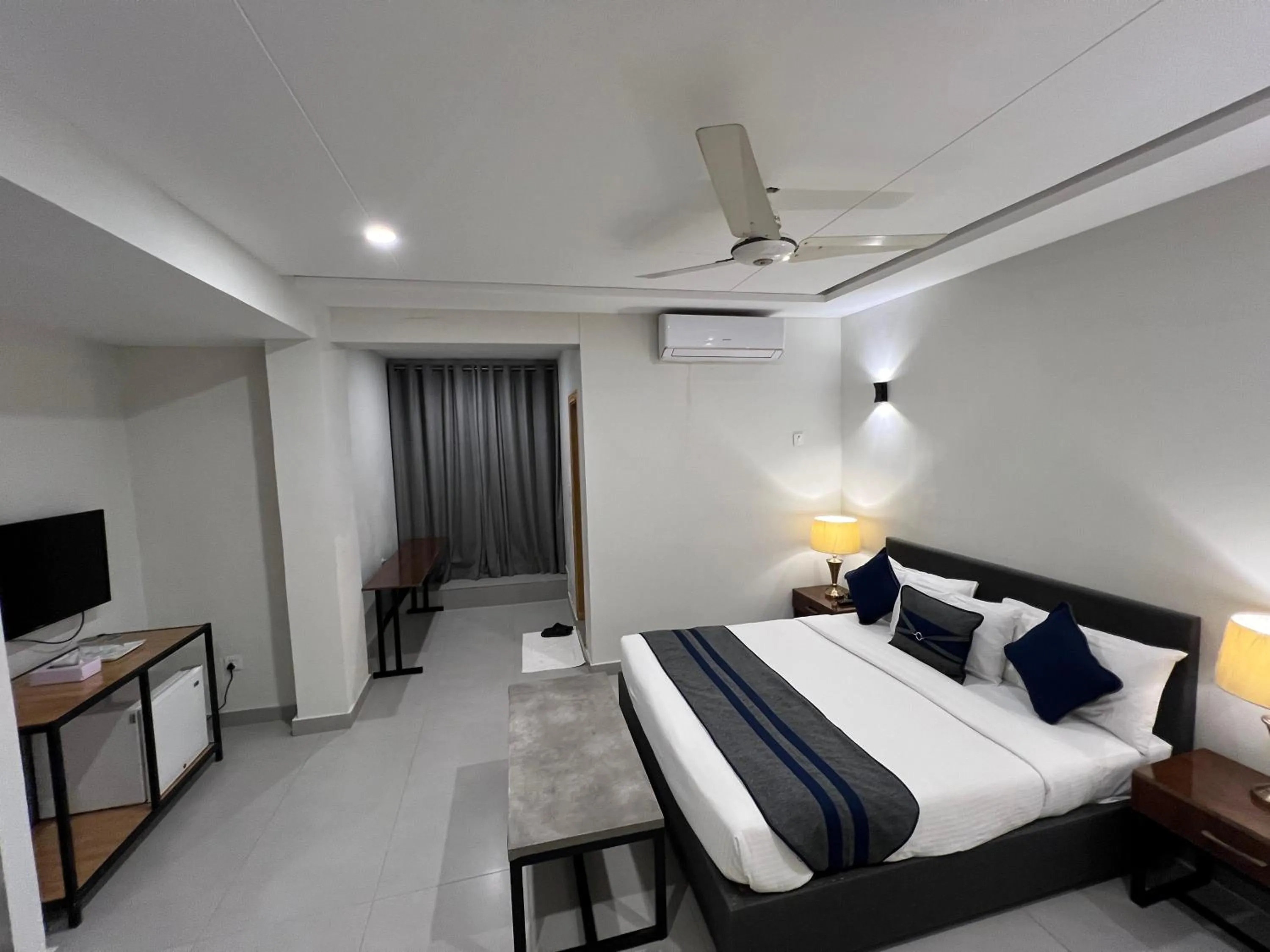 Bed in The Garden Hotel