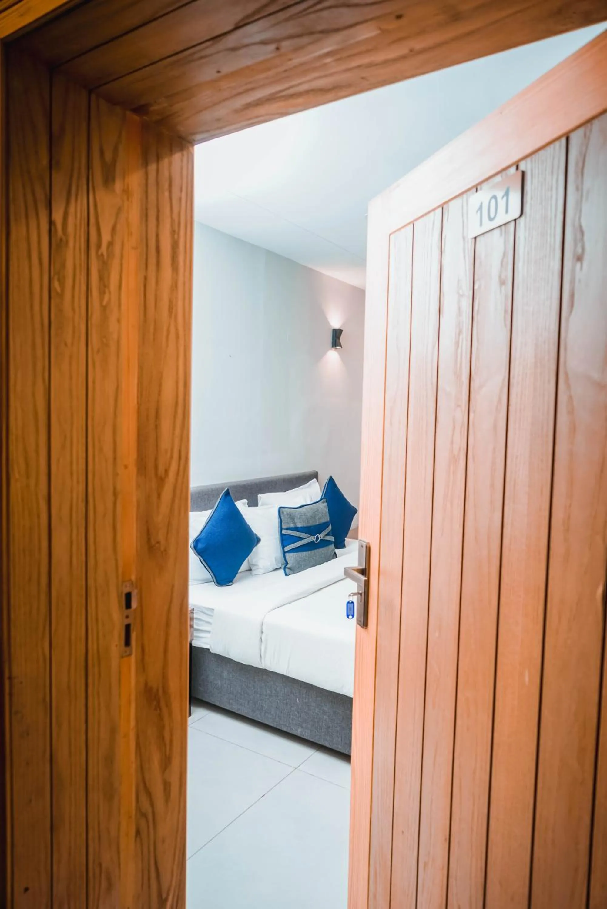 Bed in The Garden Hotel