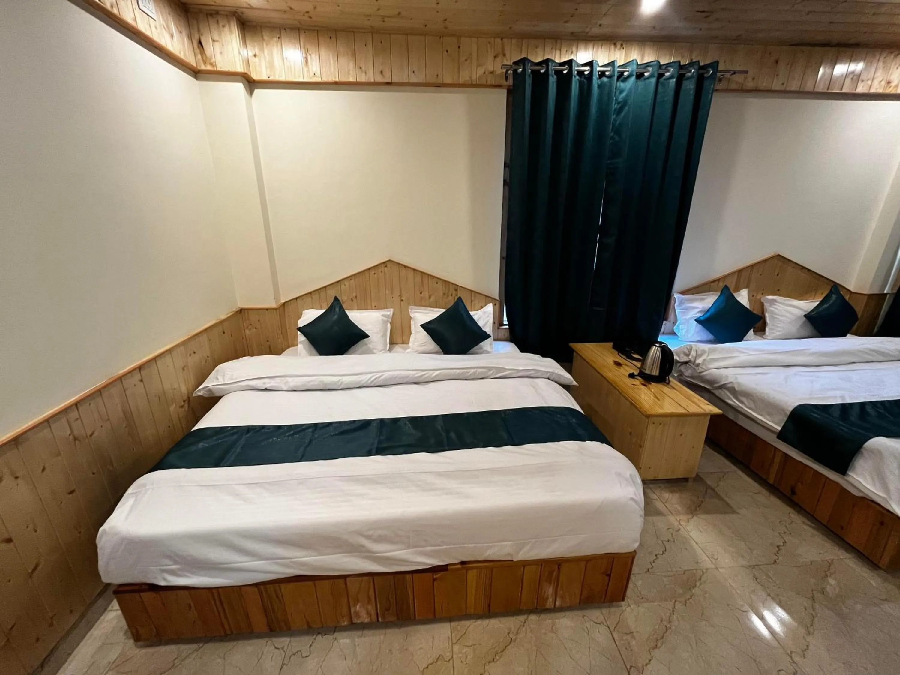 Photo of the whole room, Bed in Hotel Mid Orchard Kasol l River Side -Pure Veg Hotel