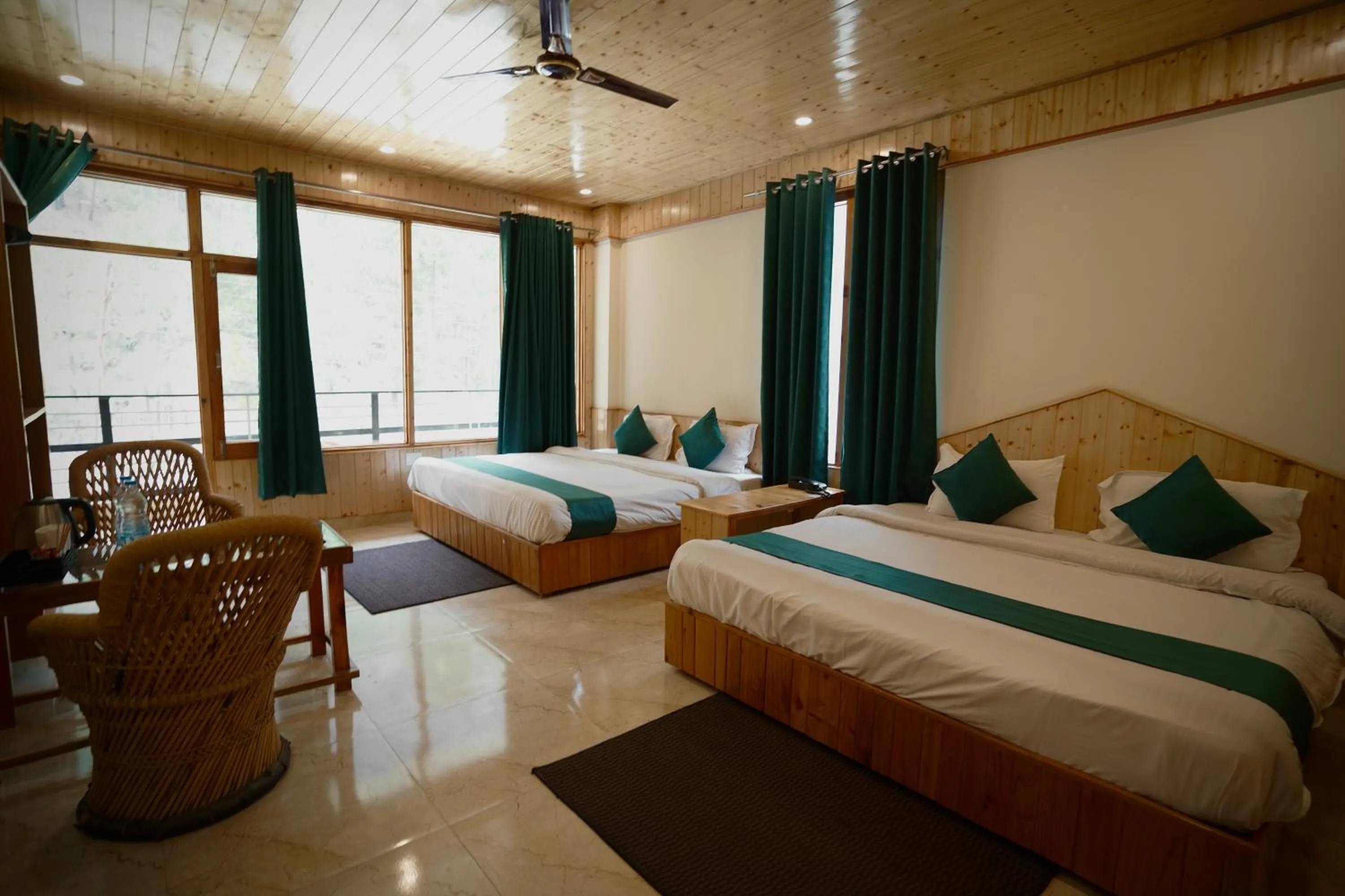 Bedroom, Bed in Hotel Mid Orchard Kasol l River Side -Pure Veg Hotel