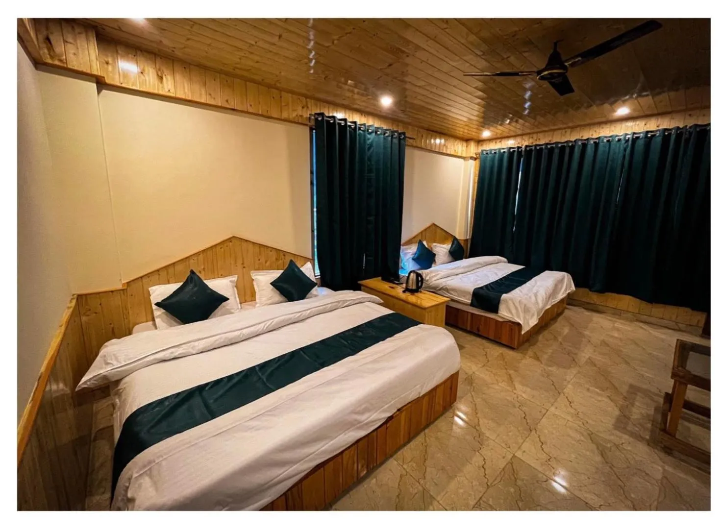 Photo of the whole room, Bed in Hotel Mid Orchard Kasol l River Side -Pure Veg Hotel