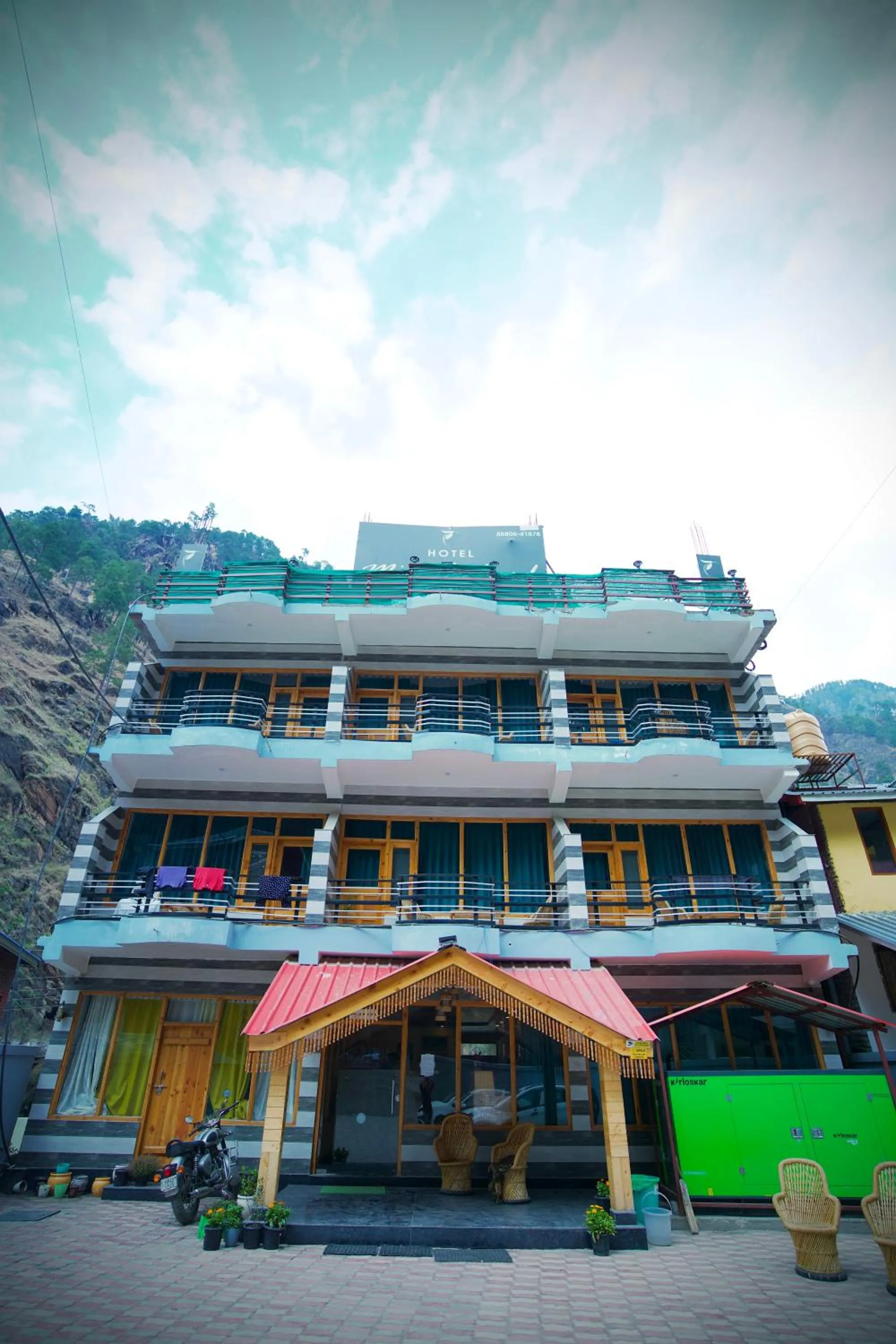 Property building in Hotel Mid Orchard Kasol l River Side -Pure Veg Hotel