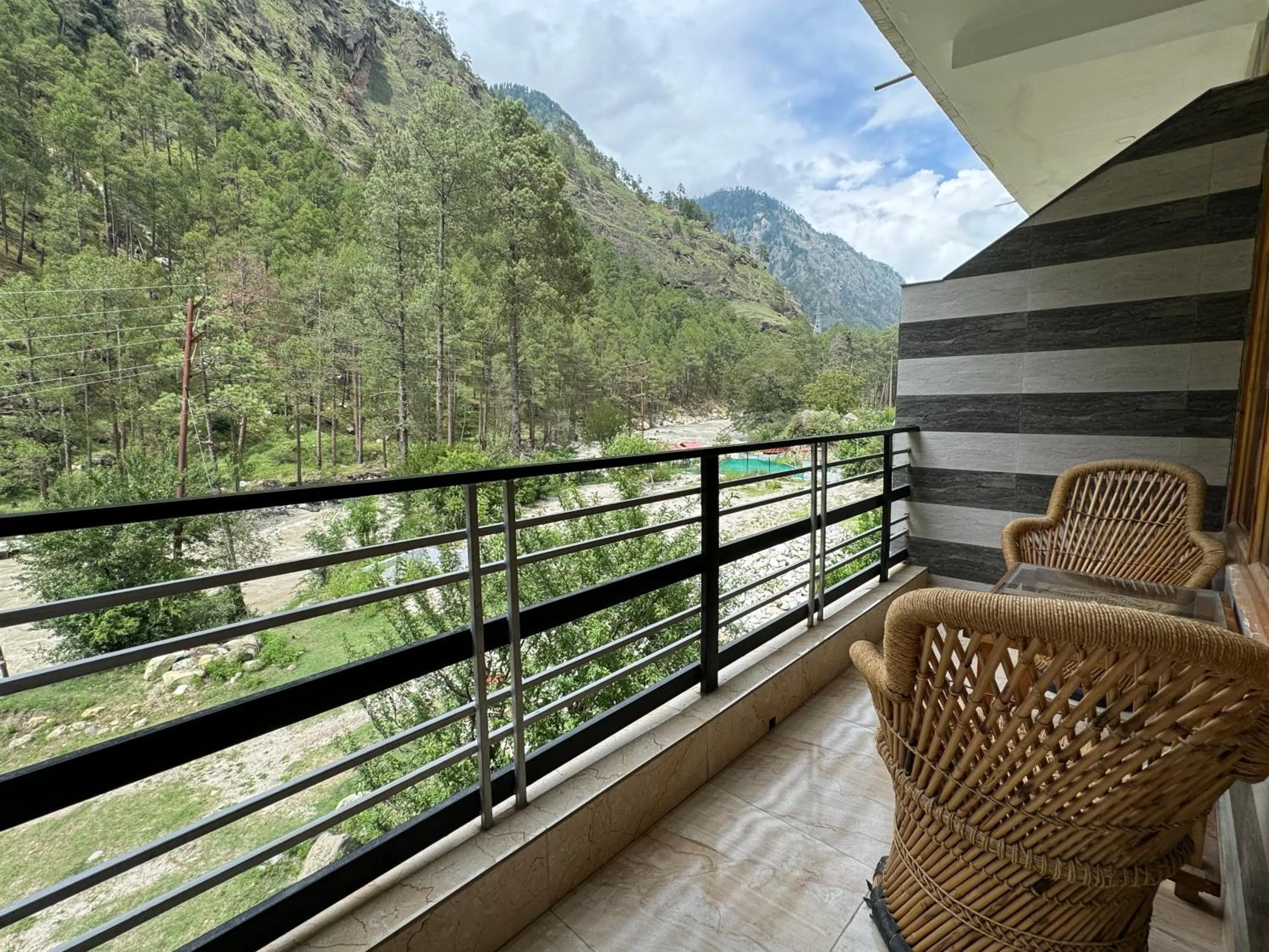 Balcony/Terrace in Hotel Mid Orchard Kasol l River Side -Pure Veg Hotel