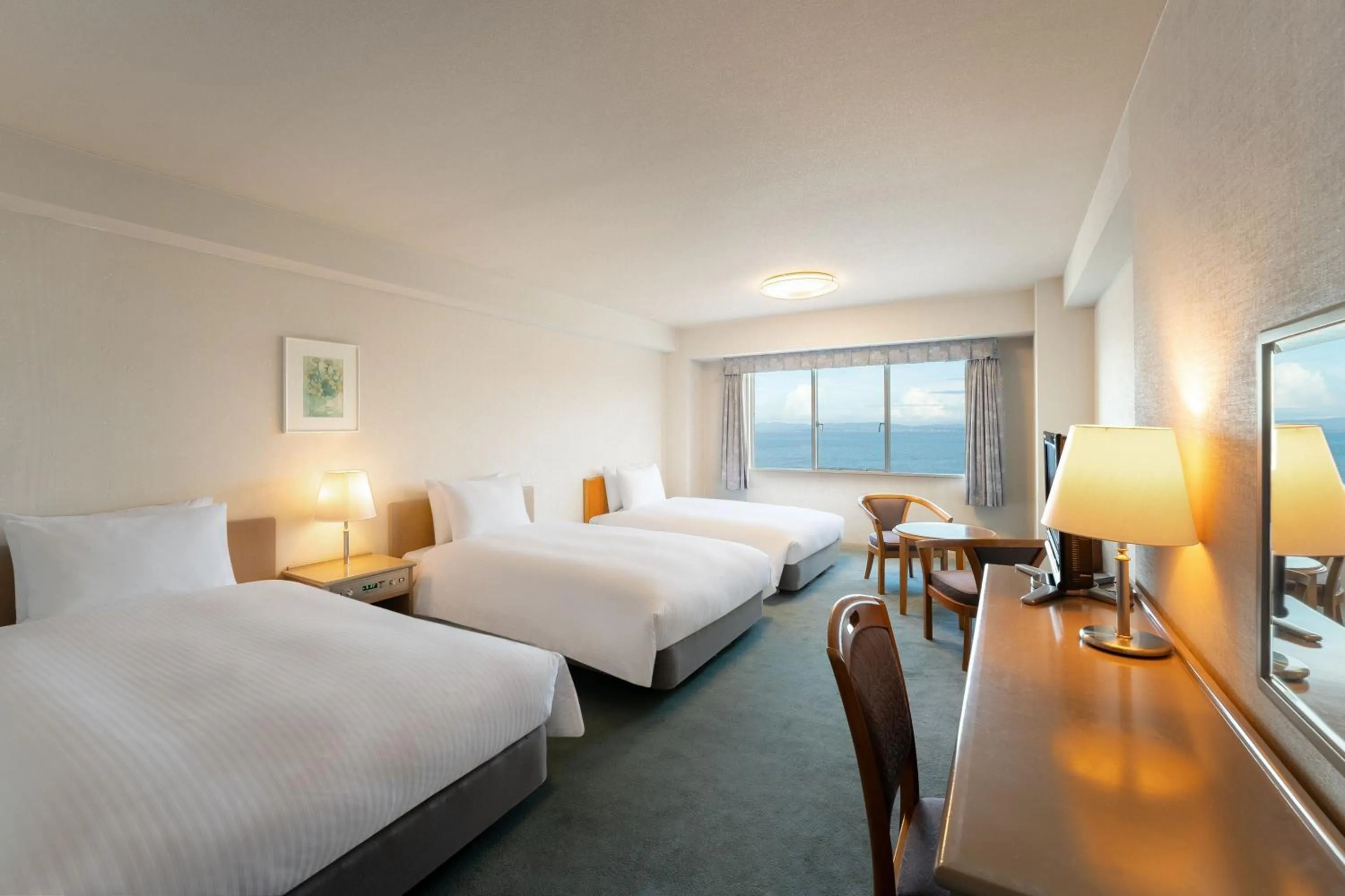 Photo of the whole room, Bed in Grand Mercure Beppu Bay Resort & Spa