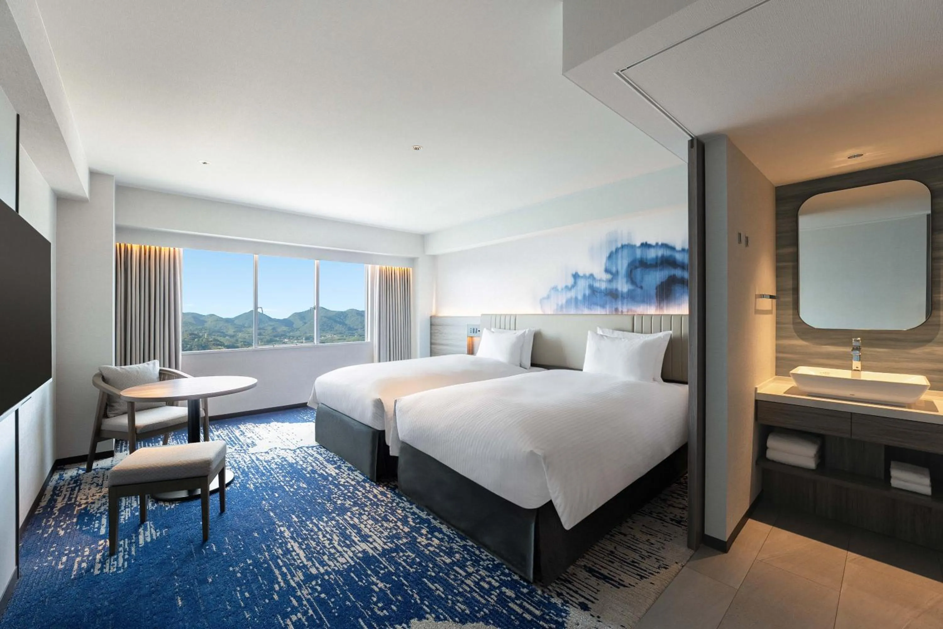 Photo of the whole room, Bed in Grand Mercure Beppu Bay Resort & Spa