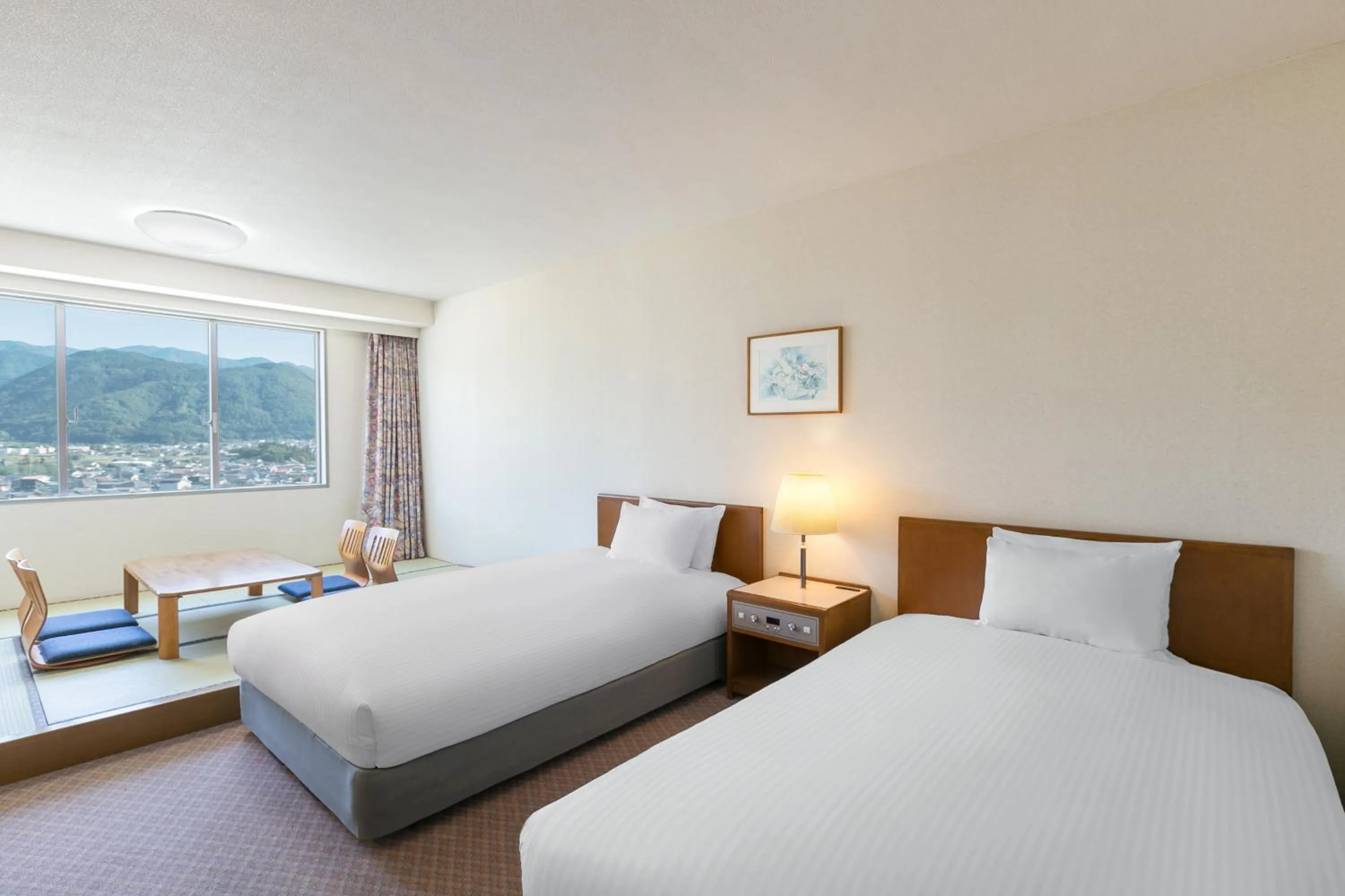 Bed in Mercure Nagano Matsushiro Resort & Spa