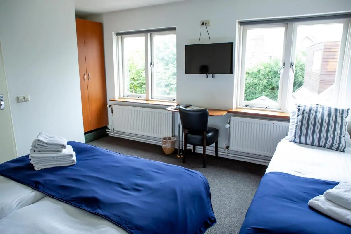 Bed in Hotel Café Restaurant Heineke
