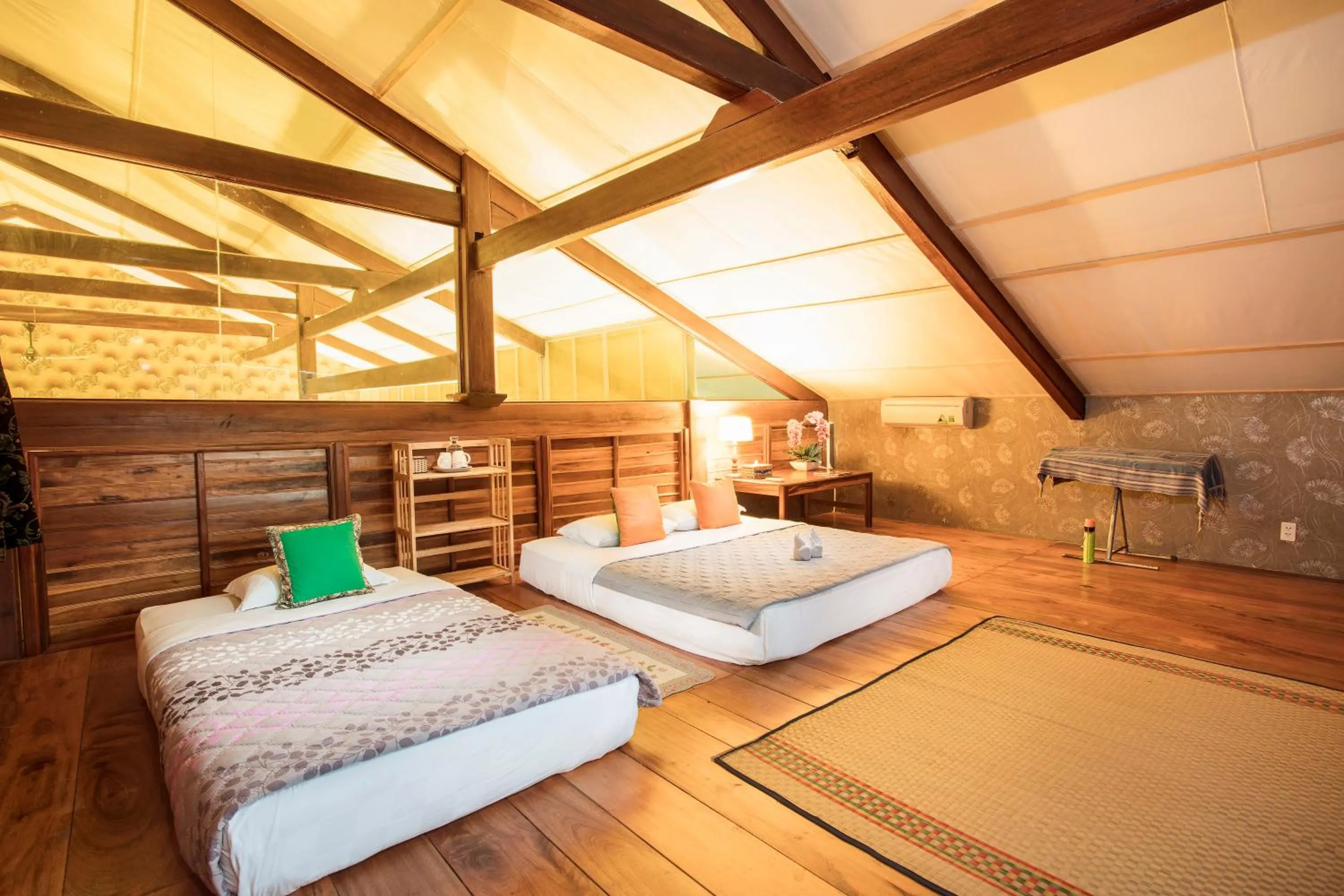 Photo of the whole room, Bed in Cat Tien Jungle Lodge