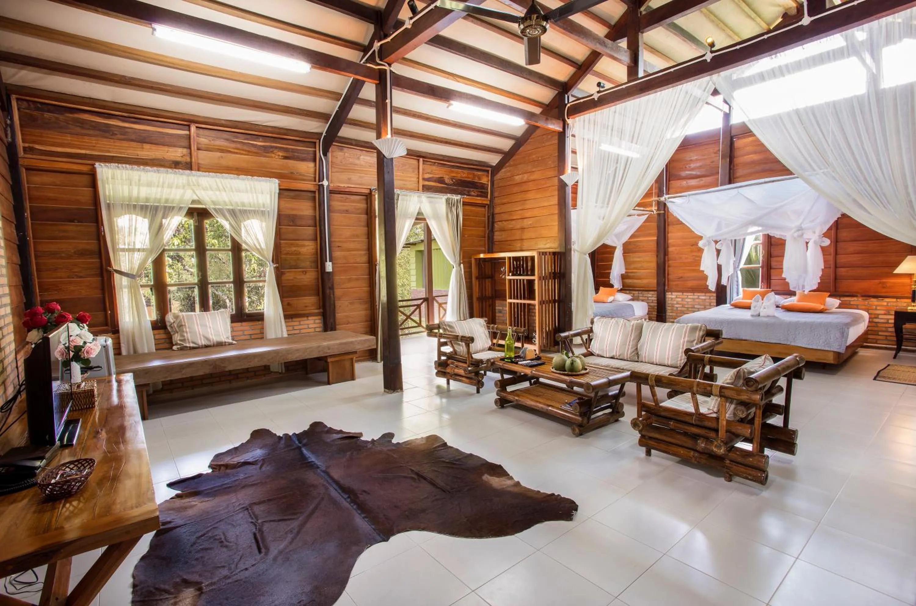 Photo of the whole room, Bed in Cat Tien Jungle Lodge