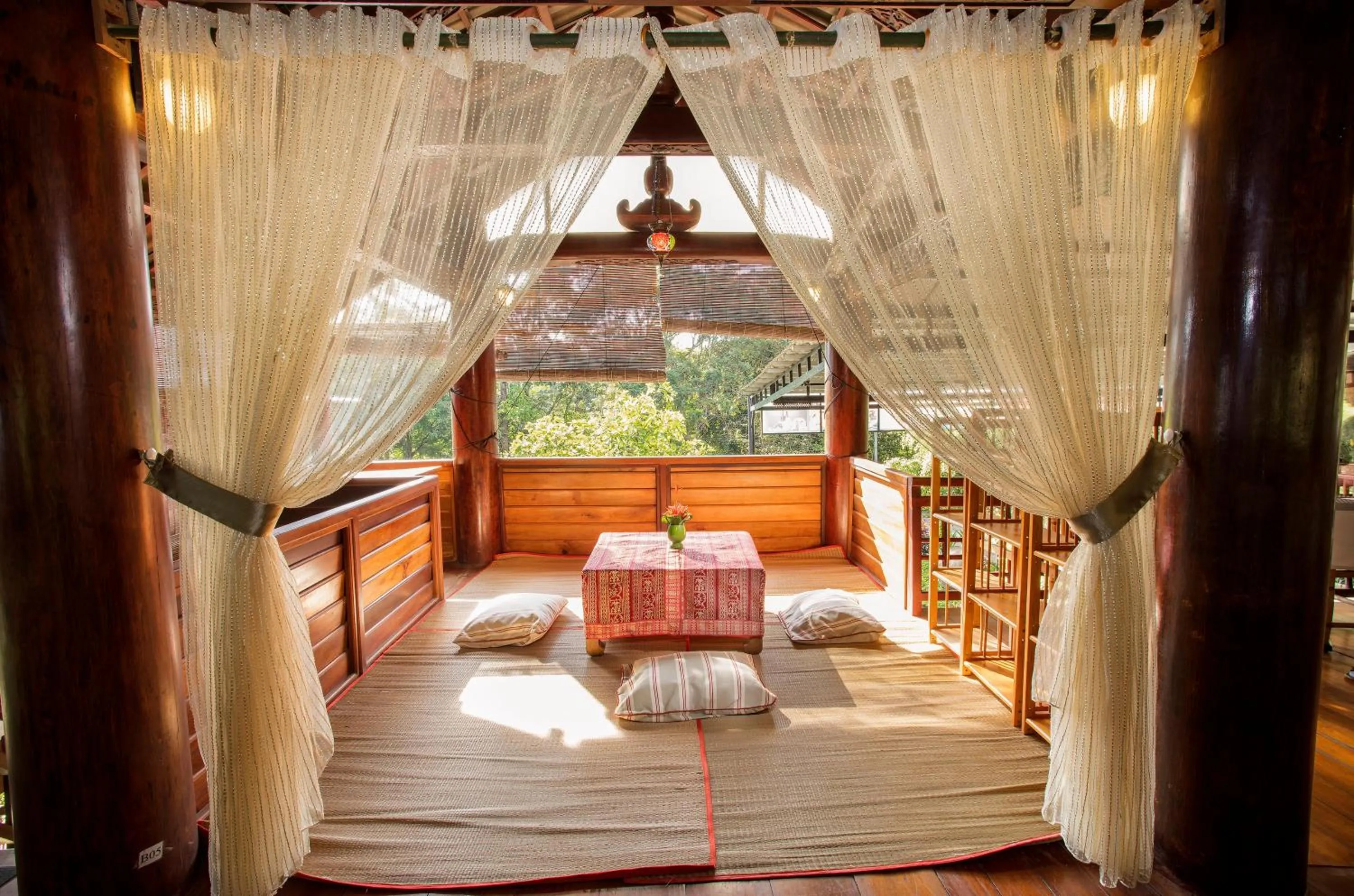 Seating area, Bed in Cat Tien Jungle Lodge