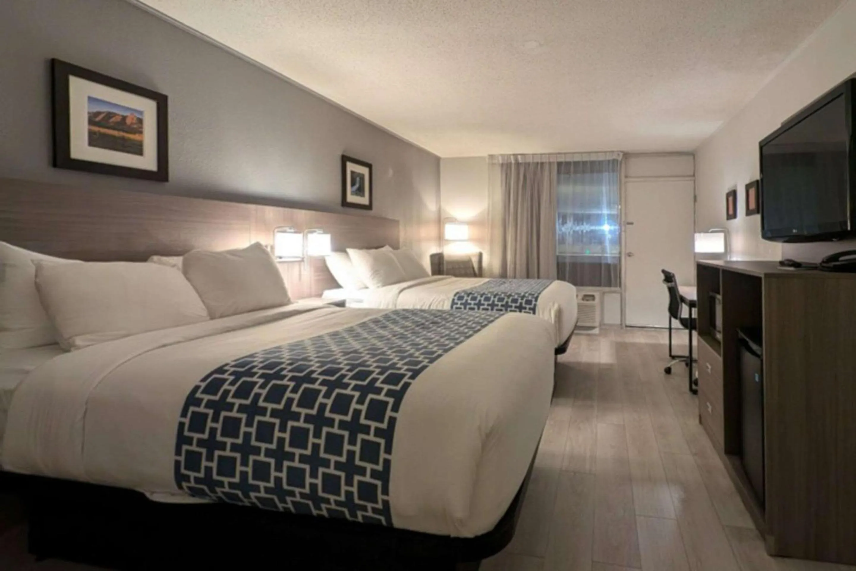 Bedroom, Bed in Clarion Inn & Suites and Convention Center