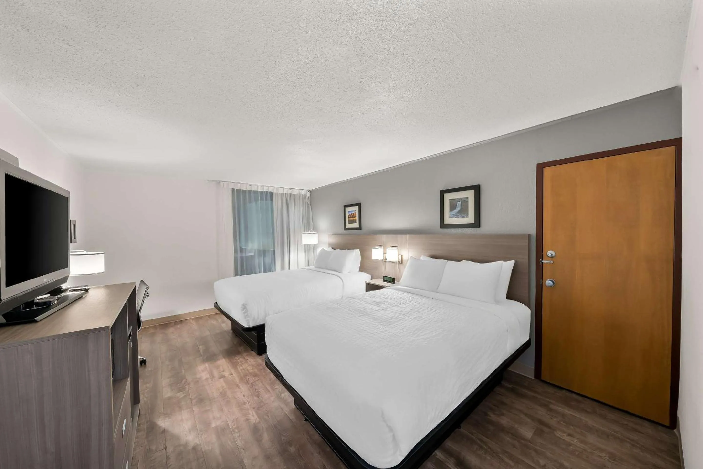 Bedroom, Bed in Clarion Inn & Suites and Convention Center