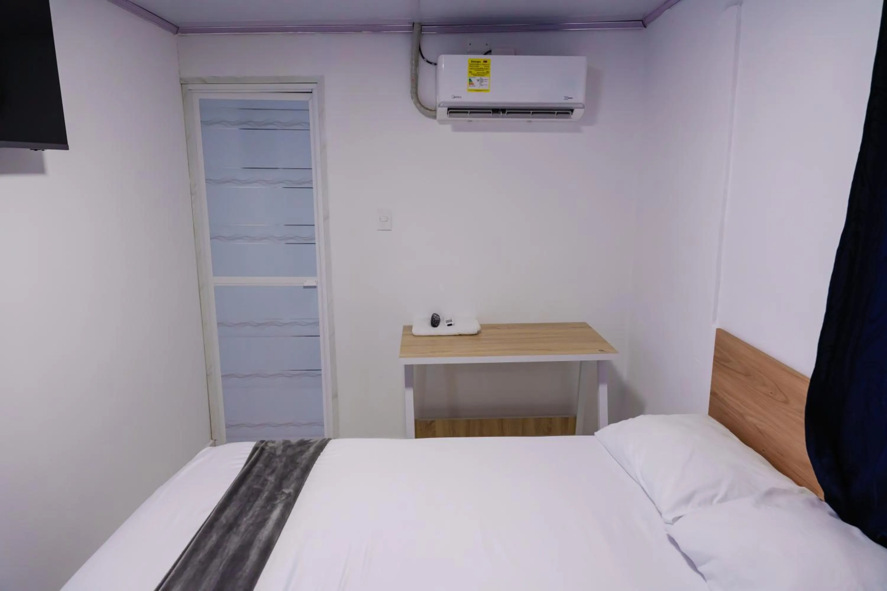 Photo of the whole room, Bed in Edificio Regata INN