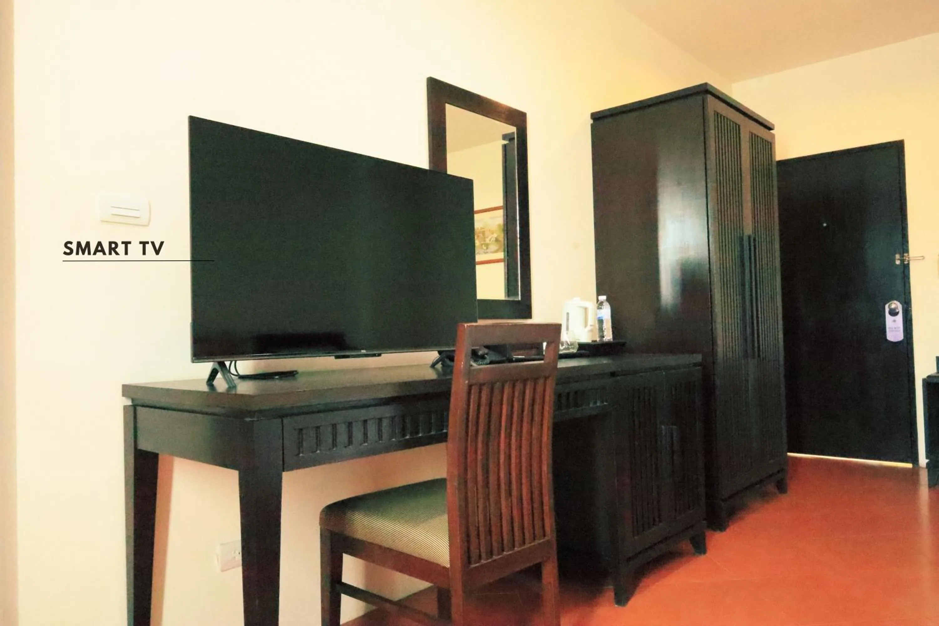 Communal lounge/ TV room in Harmony Patong Hotel