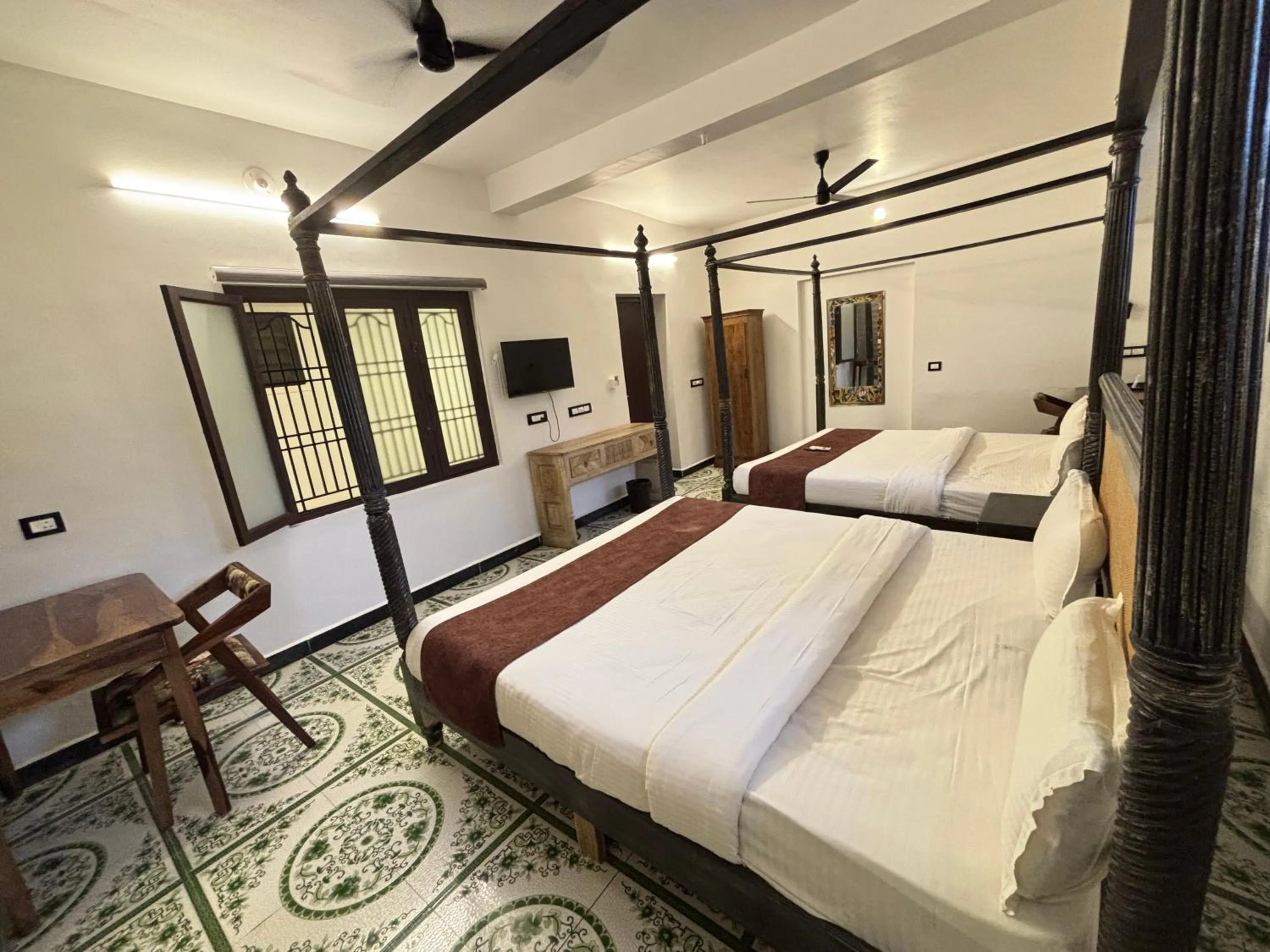 Bed in Courtyard Castle Heritage Resort