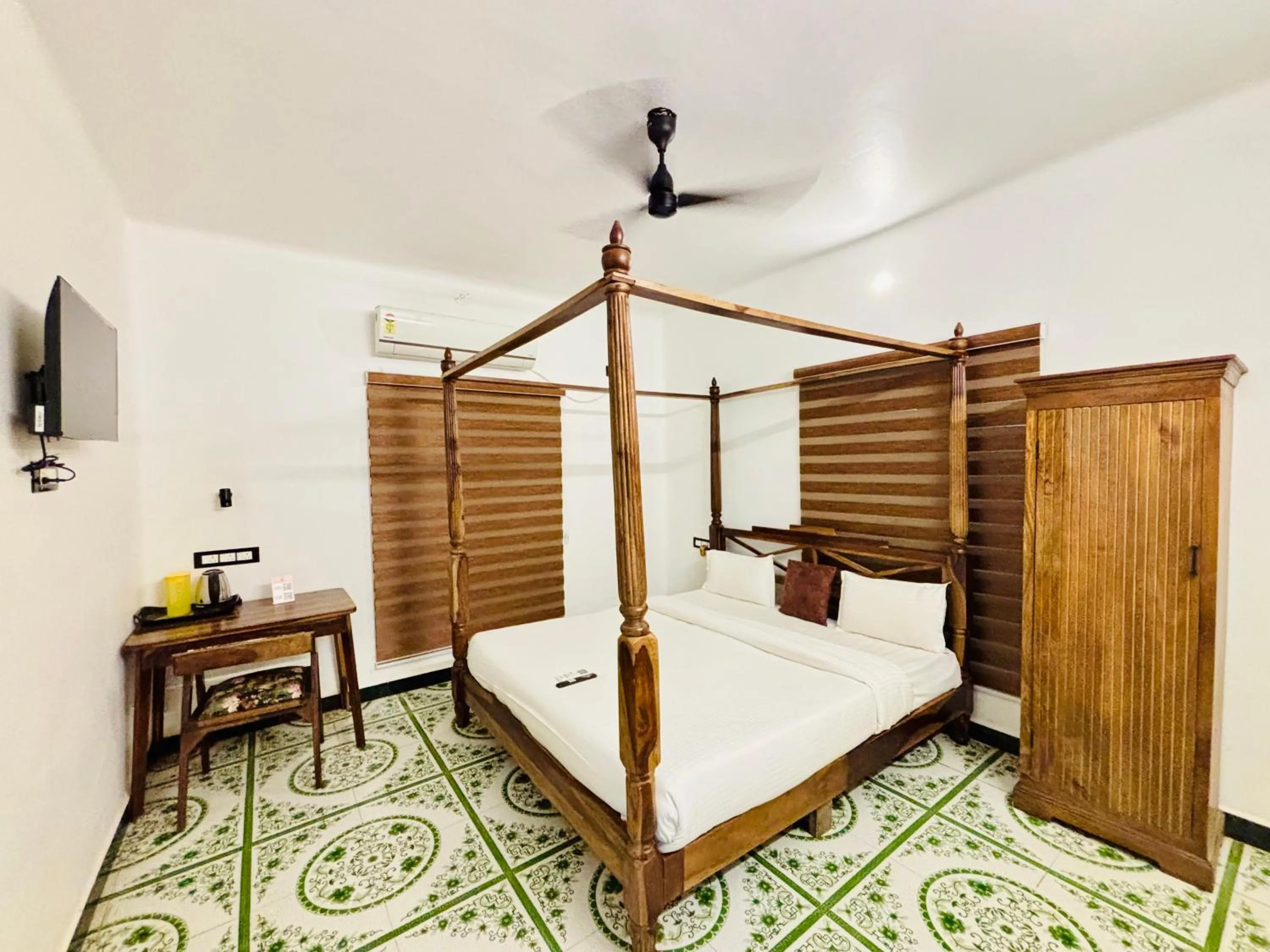 Bed in Courtyard Castle Heritage Resort