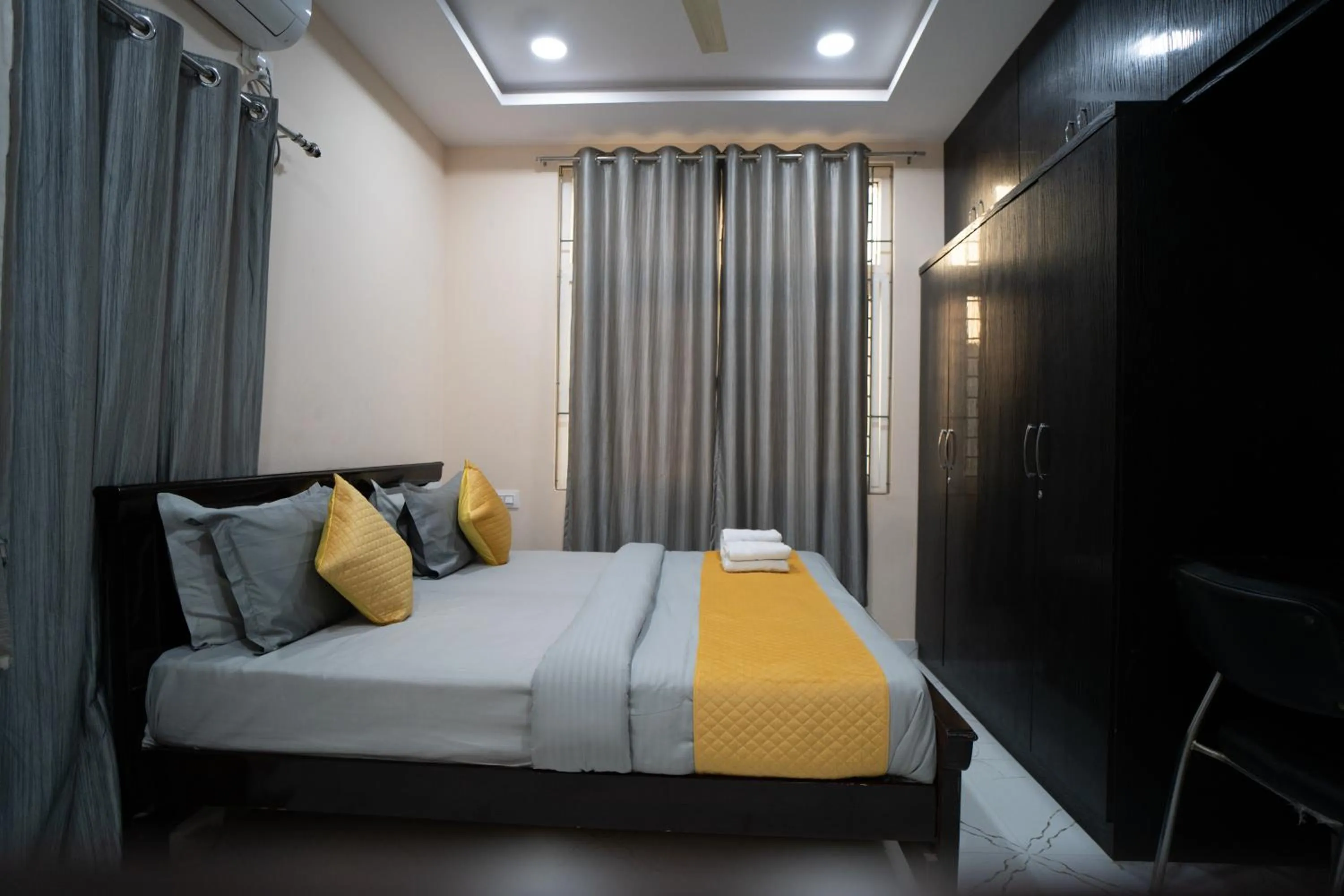 Bed in Yellow Bells Gachibowli