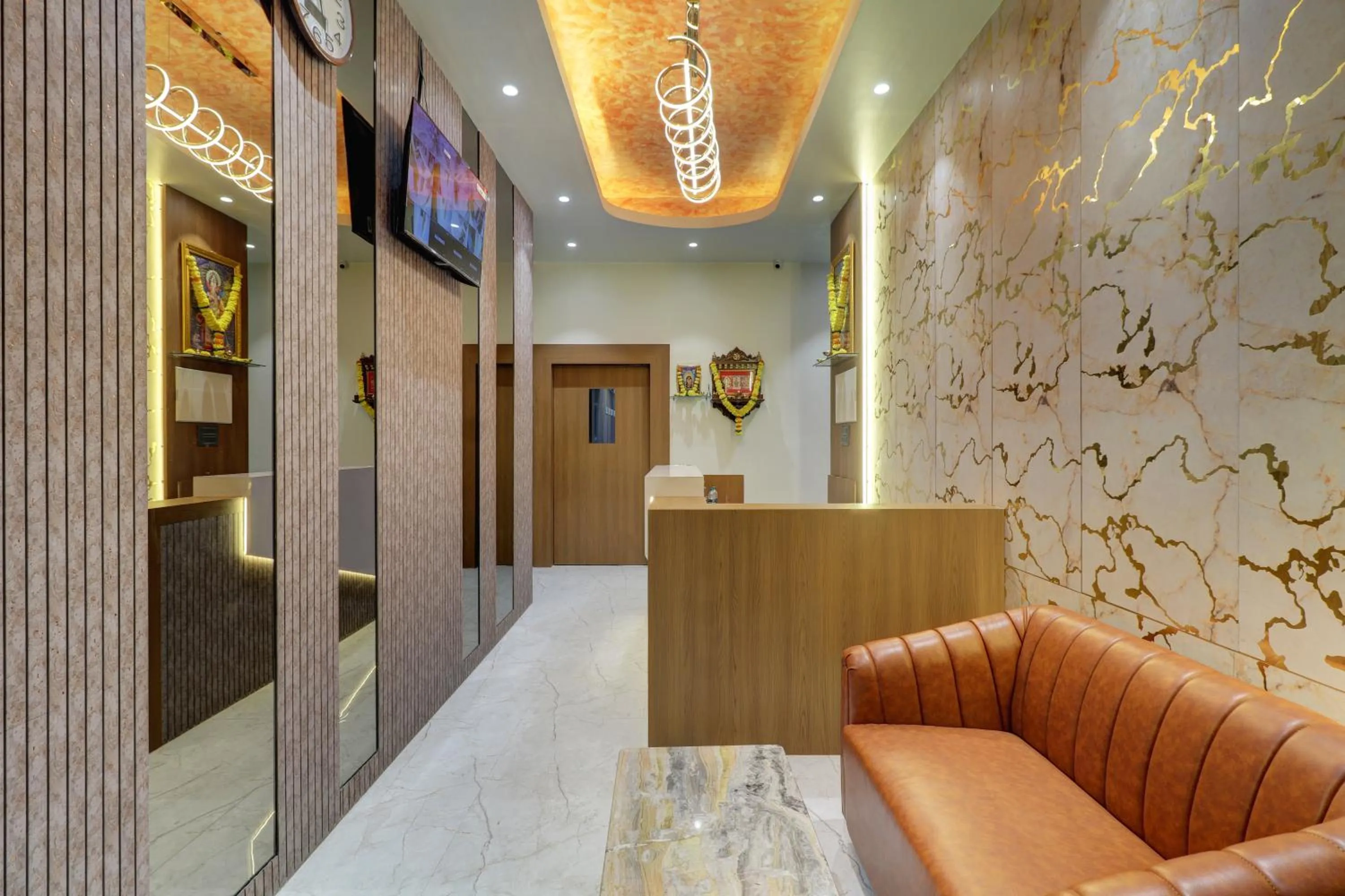 Communal lounge/ TV room, Bed in Radhe Residency