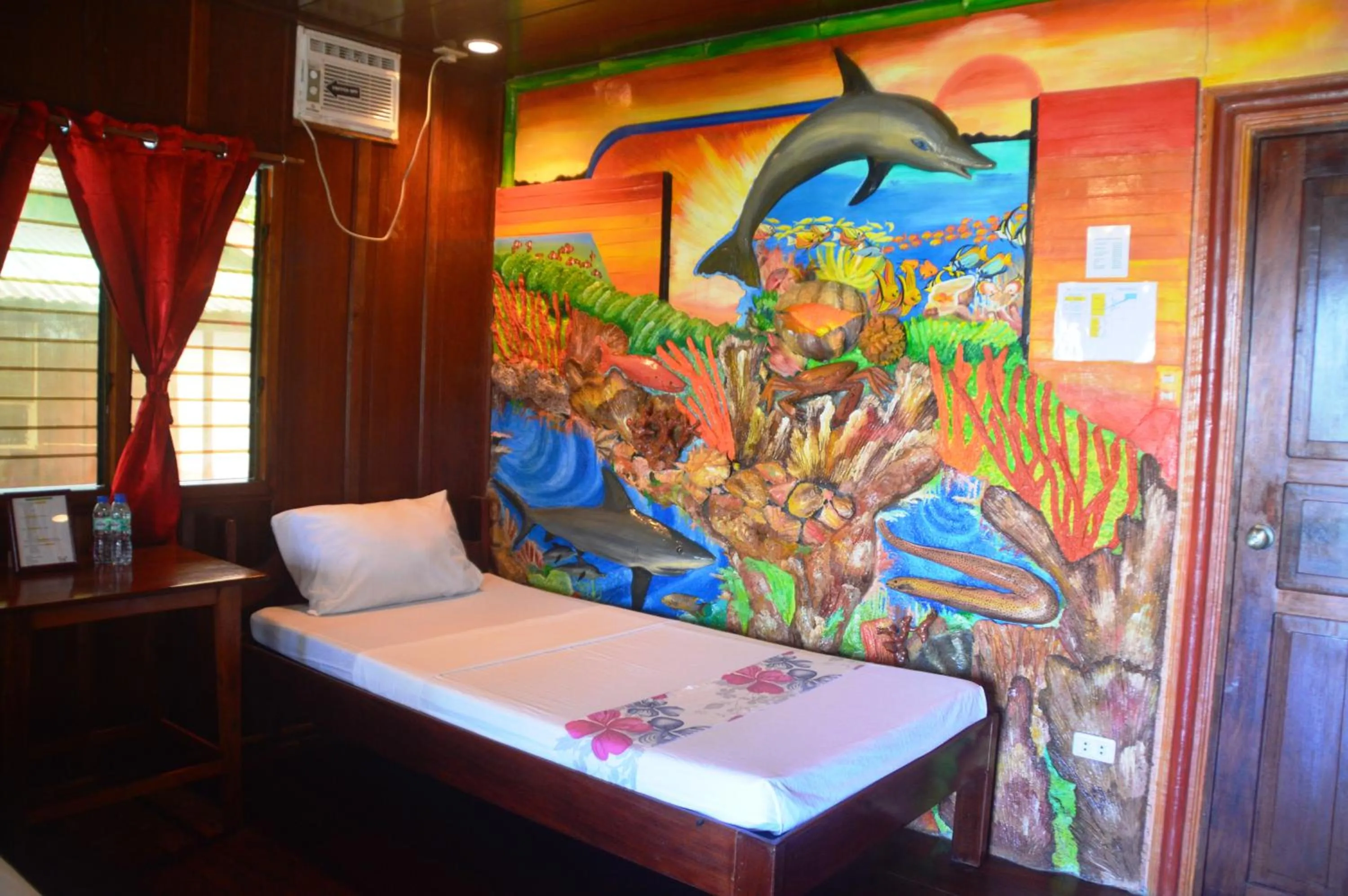 Bed in Ausan Beach Front Cottages
