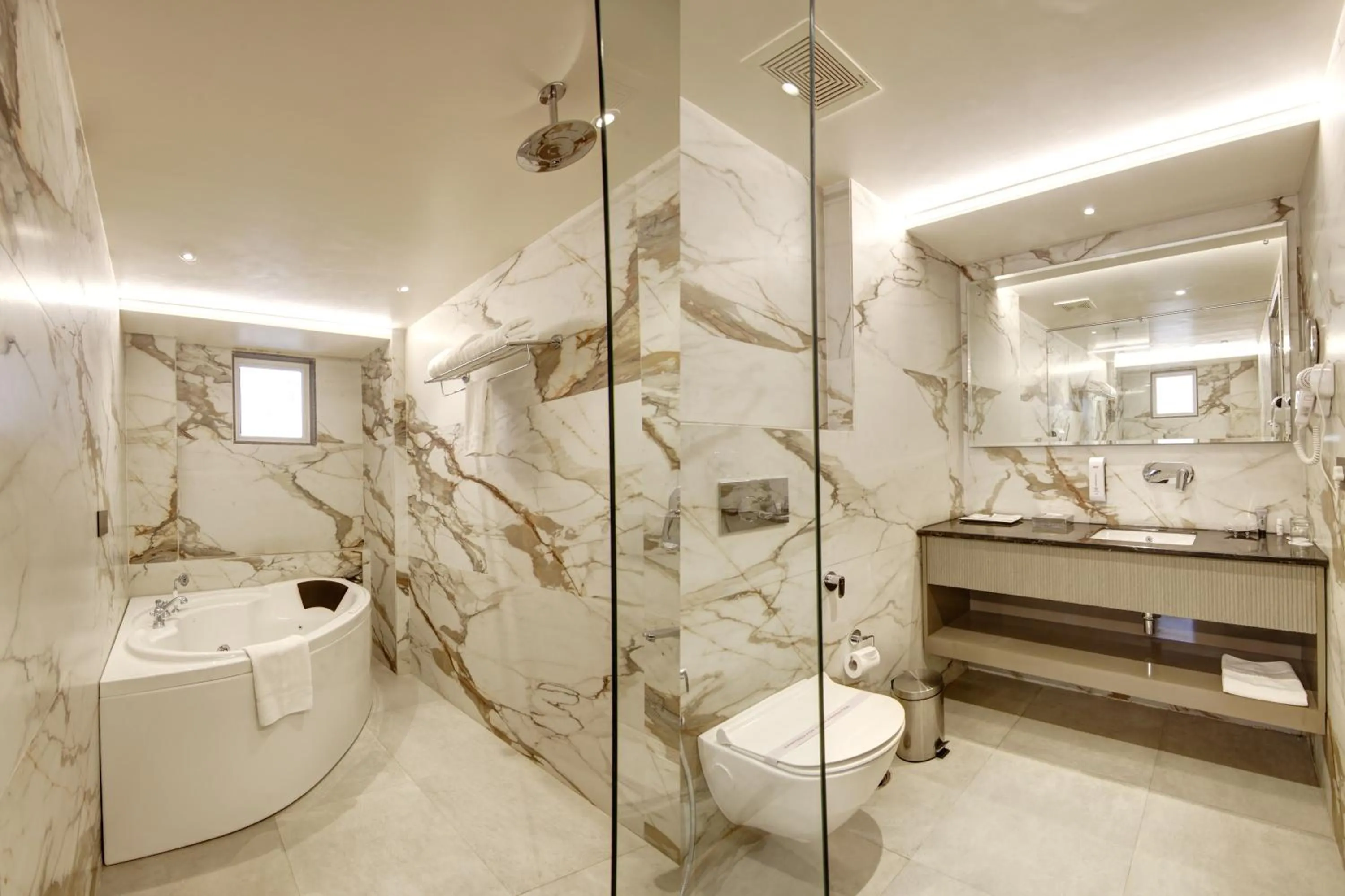 Bathroom in Stepstones Hotels and Inn-DLF PHASE 3 GURGAON