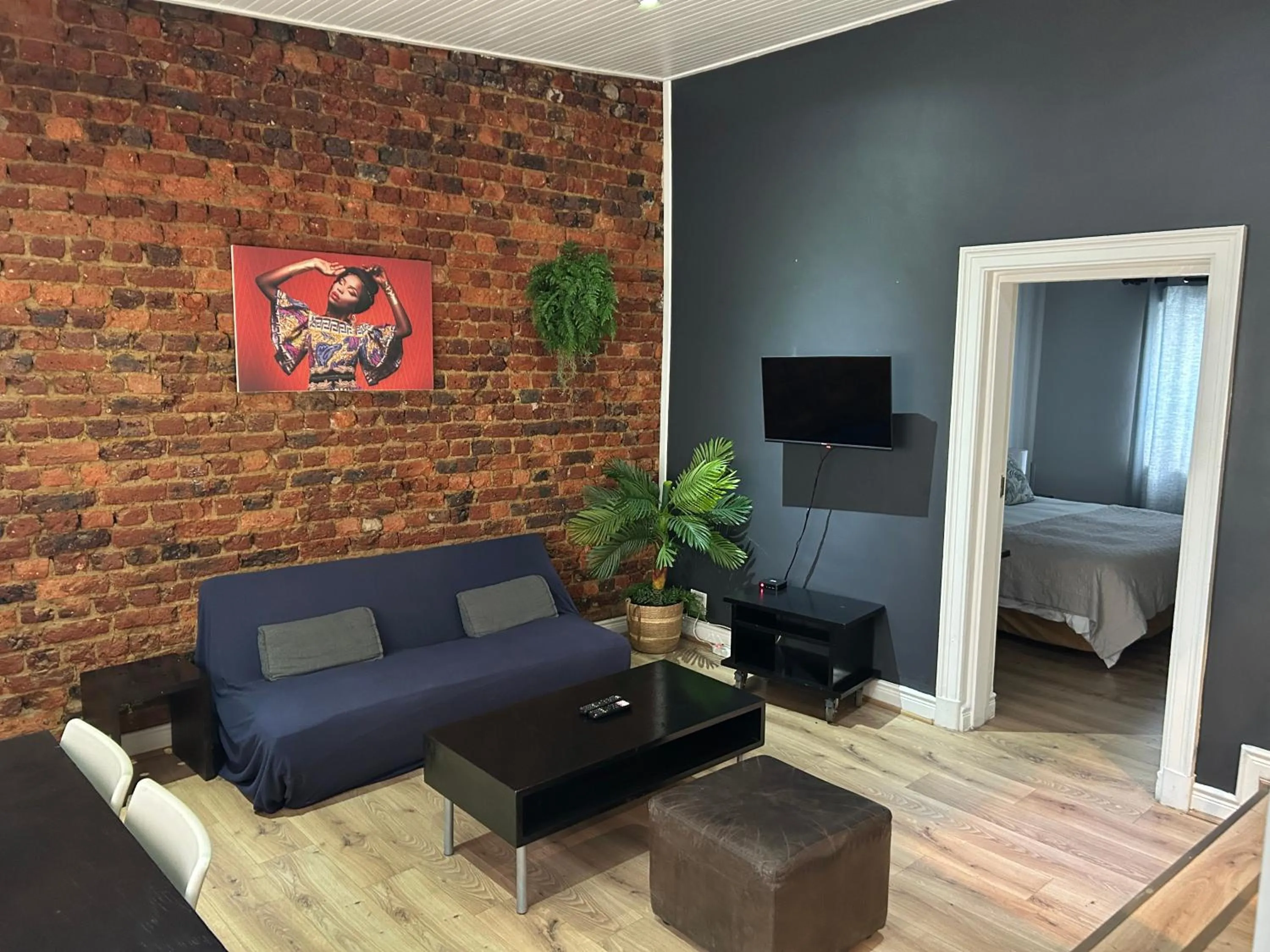 Living room, Bed in Long Street Self Catering Apartments