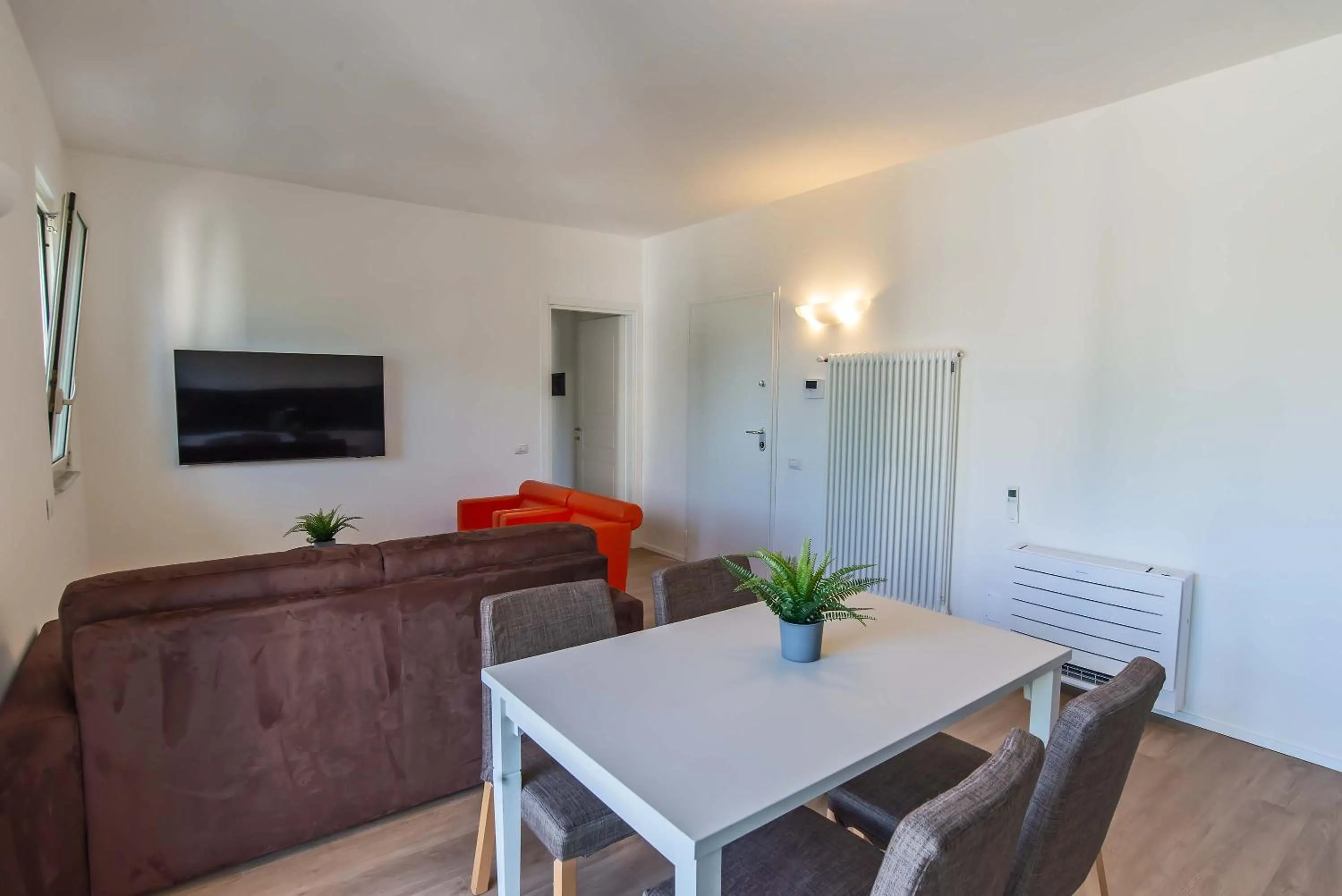 Communal lounge/ TV room in Appartamenti Tre Fontane