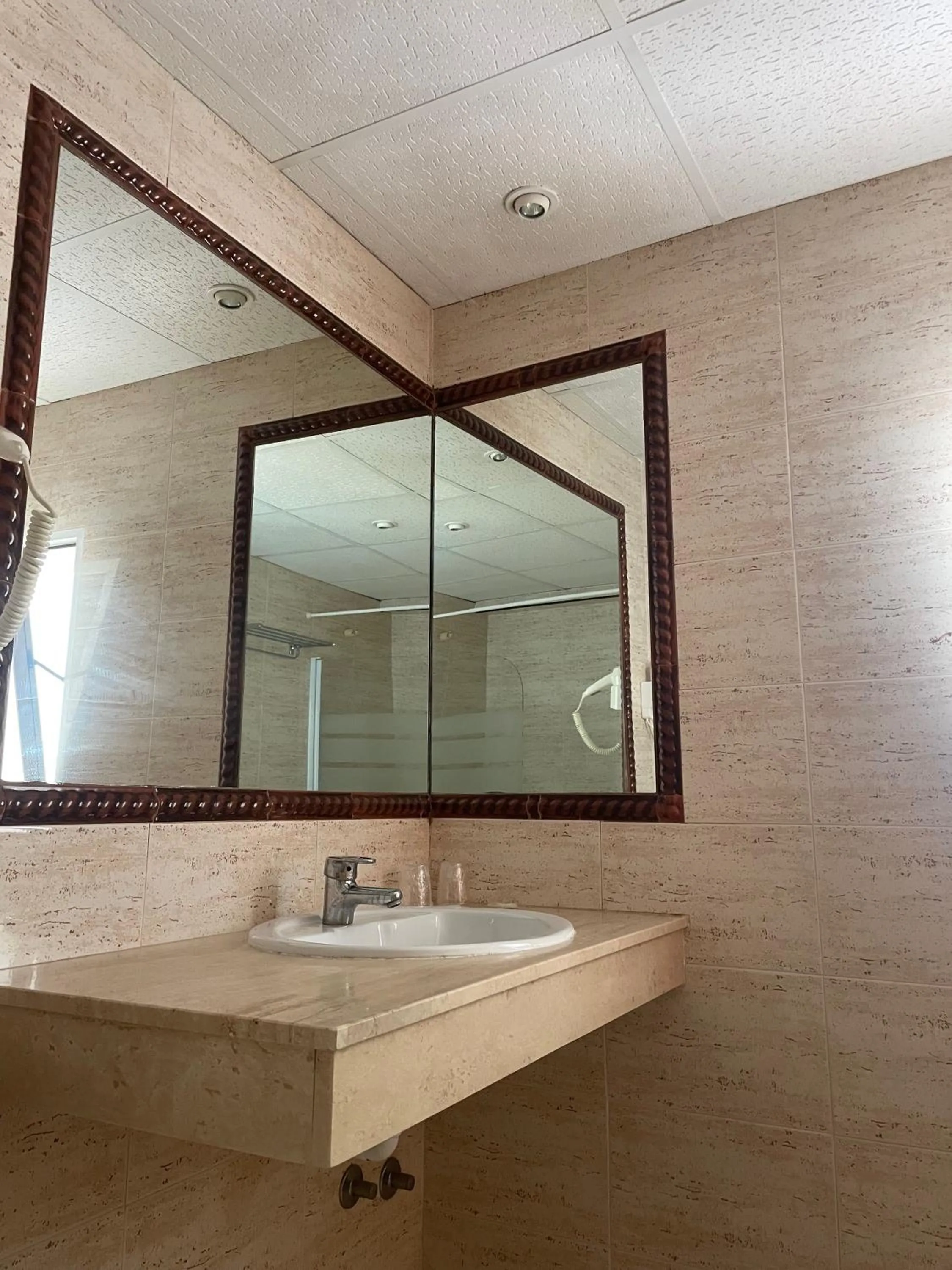 Bathroom in Fleming Center by Punta 25 Hotels Group