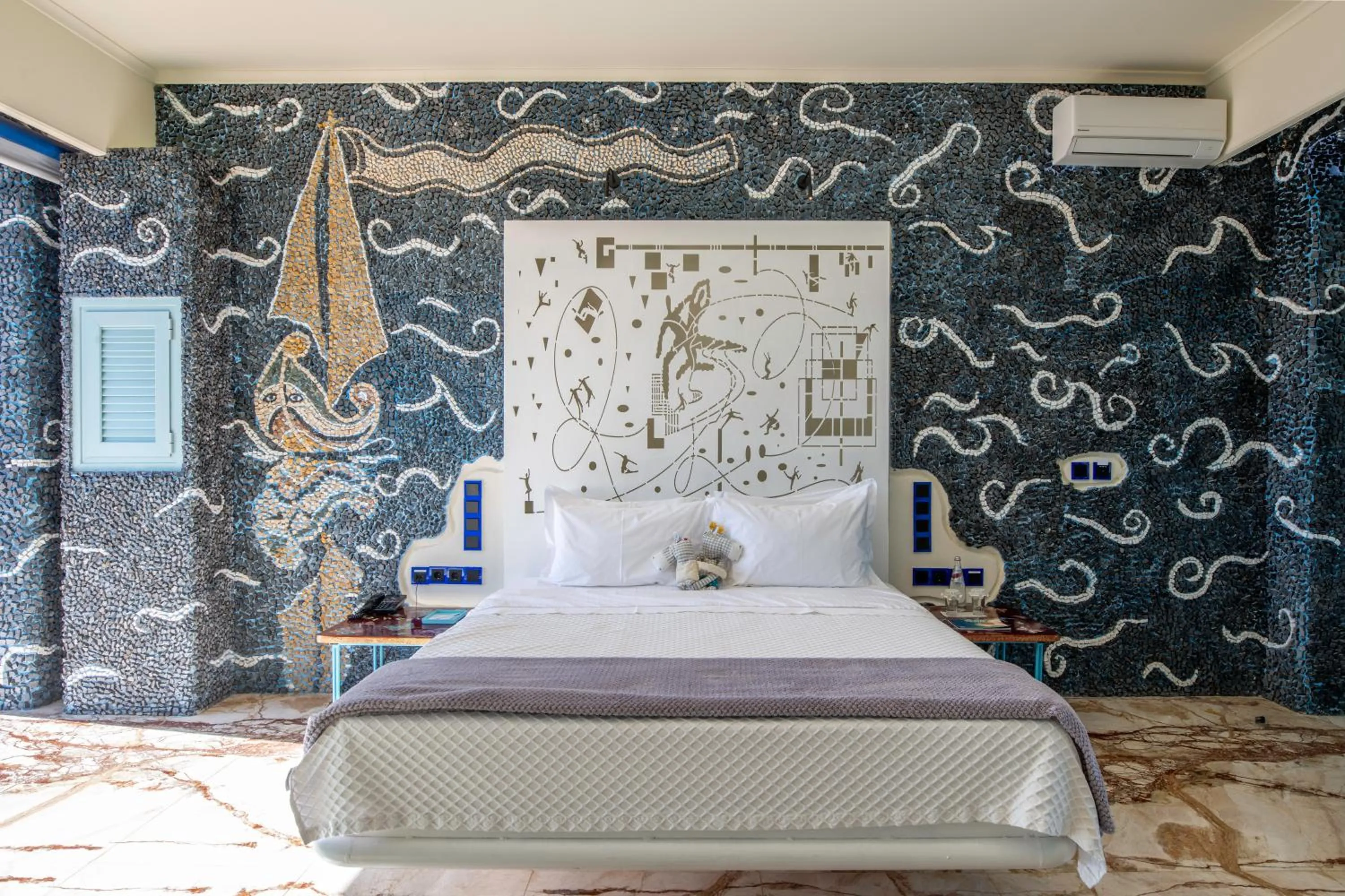 Bed in Agalia Luxury Suites