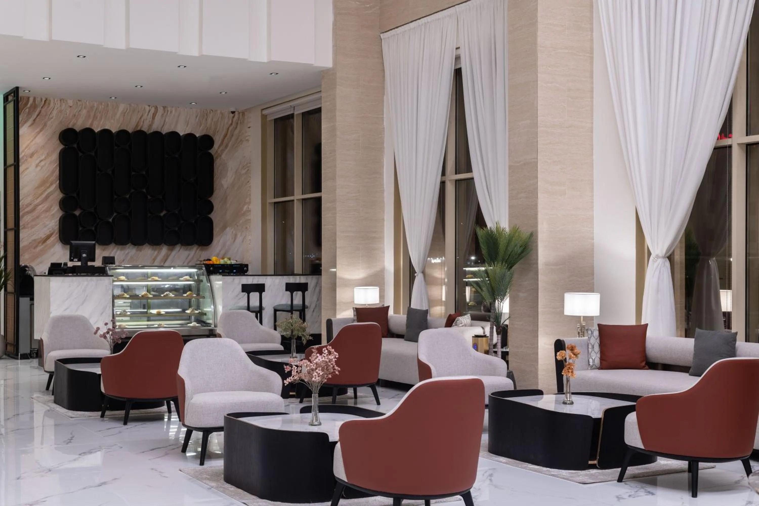 Lobby or reception in Enala Hotel- Umluj