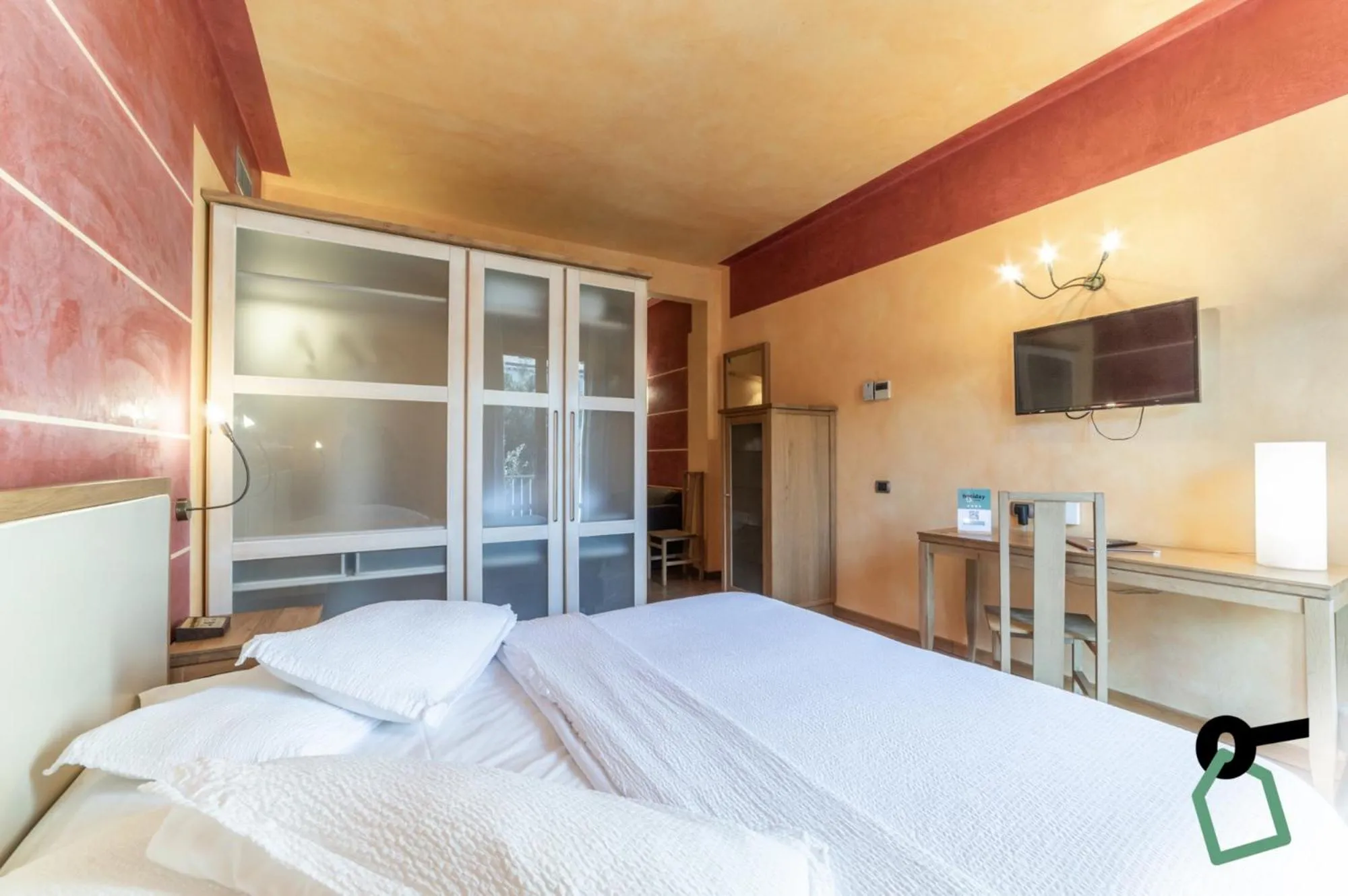 Bed in HOTIDAY Discovery - Residence Verona