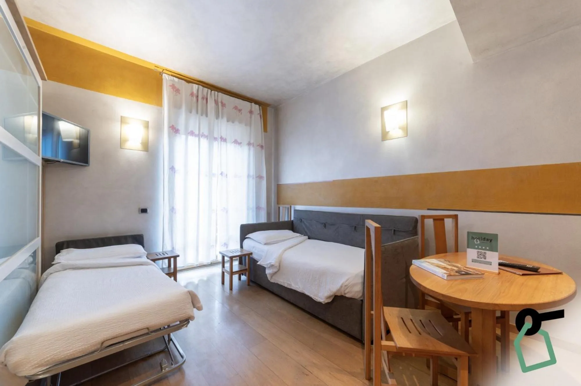 Photo of the whole room in HOTIDAY Discovery - Residence Verona