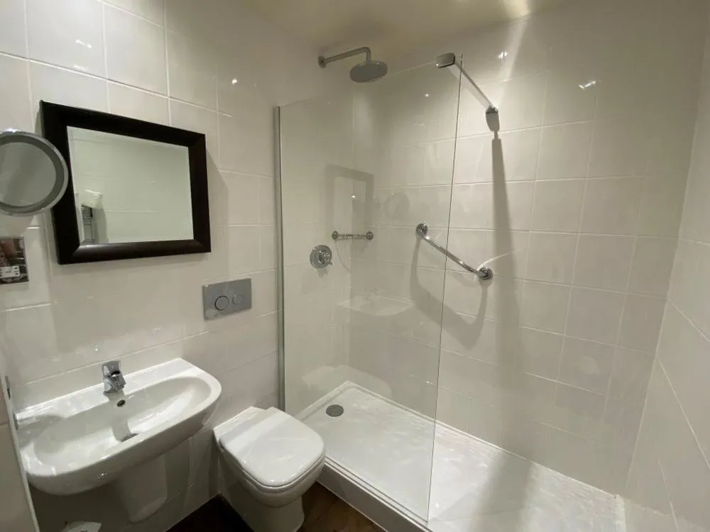 Bathroom in The Bear Of Rodborough Hotel