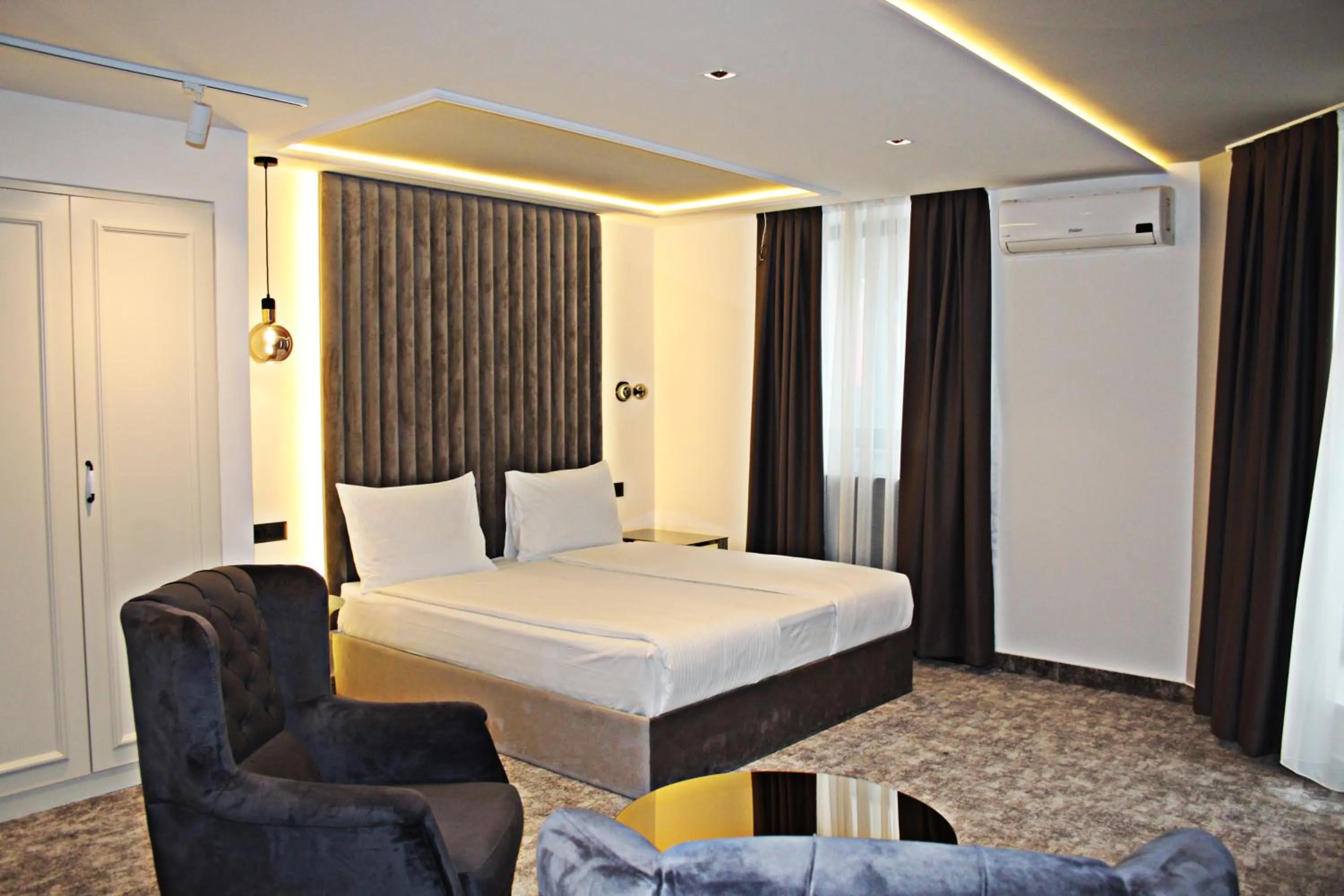 Seating area, Bed in Hotel Boutique Bristol