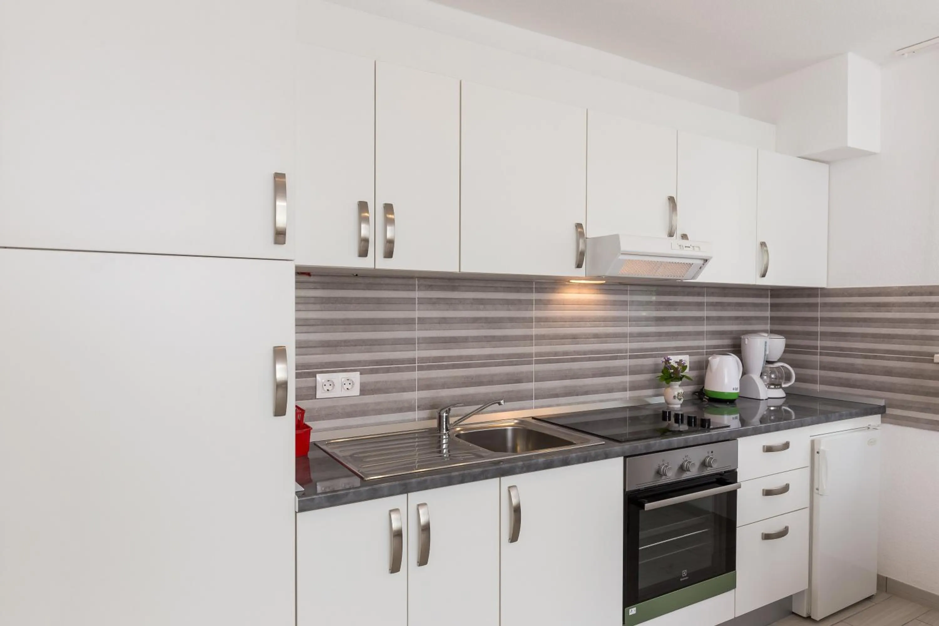 Kitchen or kitchenette in Villa Celenca