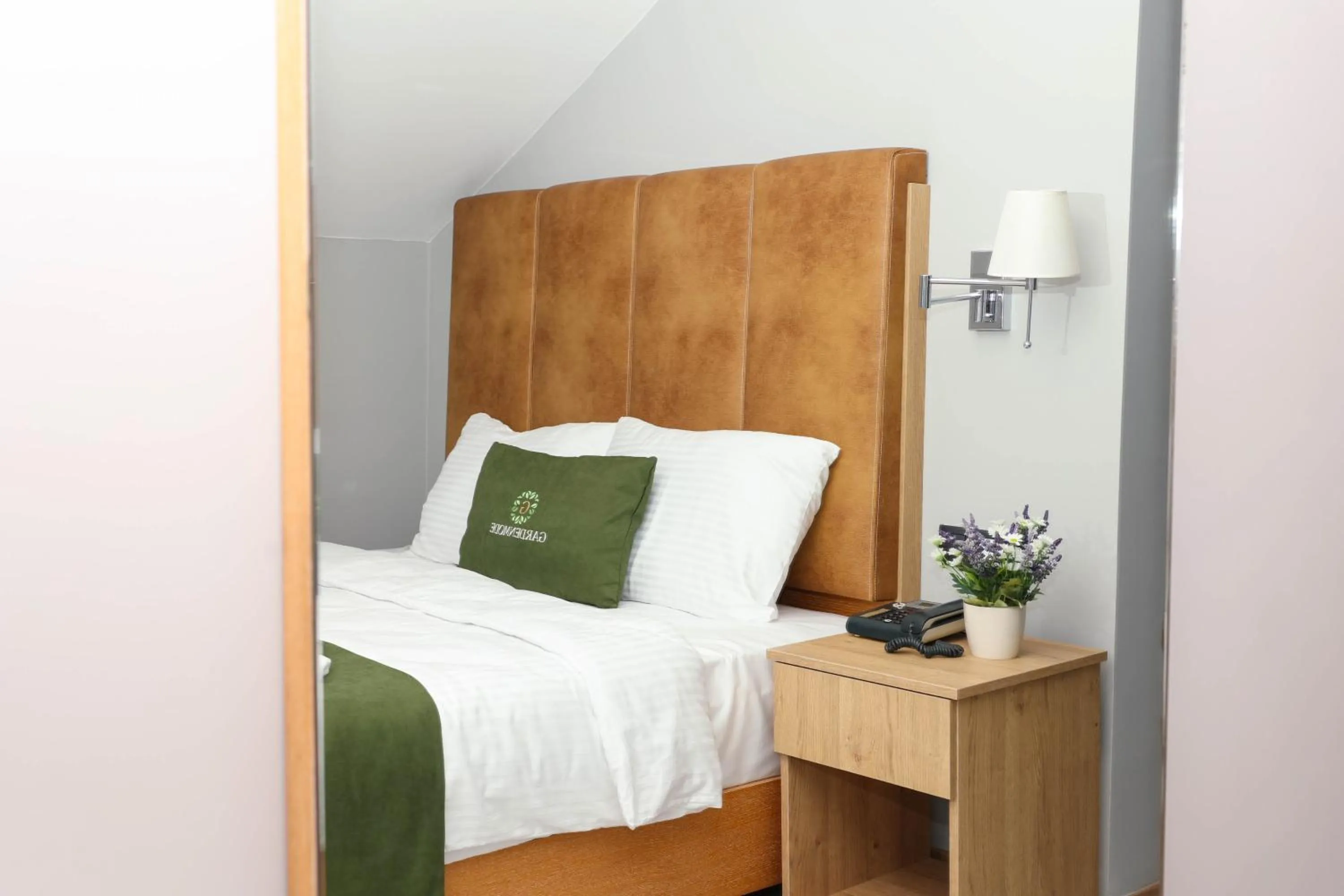 Bed in Gardenmode Airport Hotel