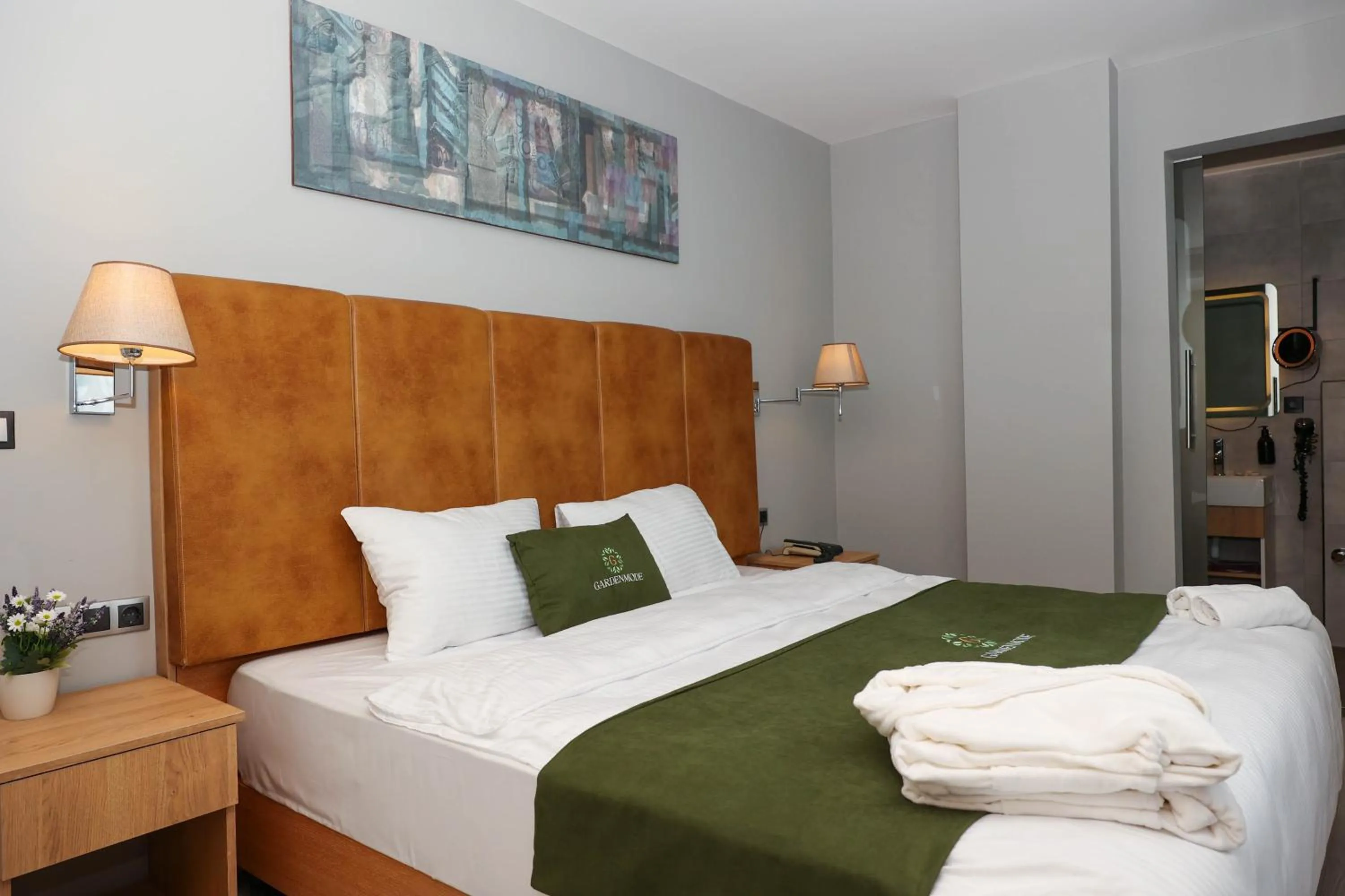 Bed in Gardenmode Airport Hotel