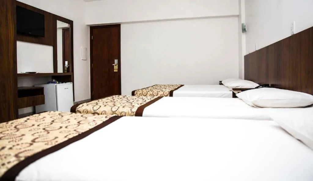 Bed in Gálatas Golden Hotel