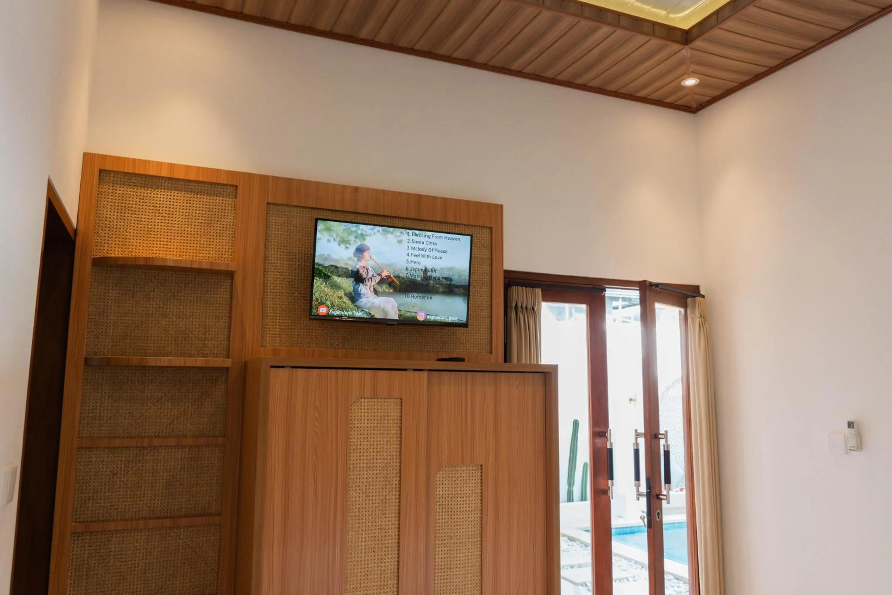 Bedroom in Melviano Suite & Villa