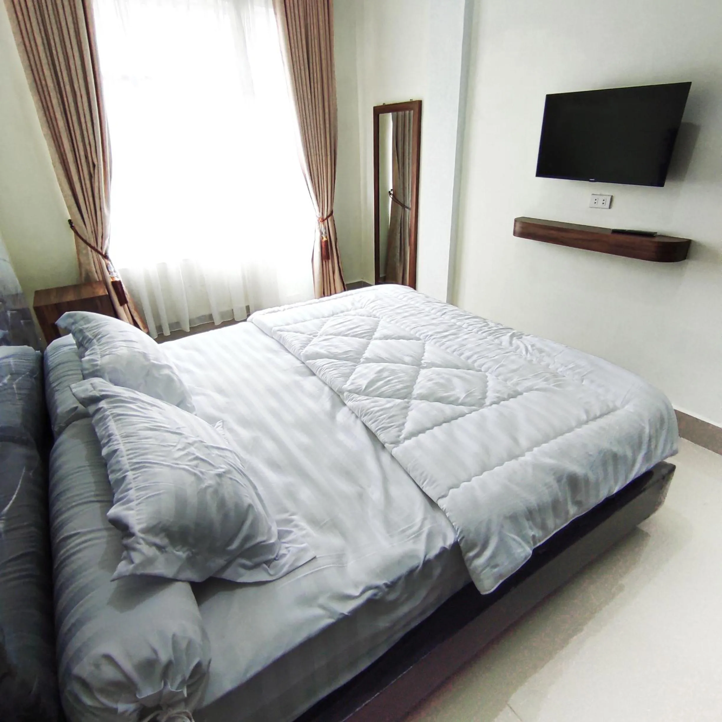 Bed in Kala Guest House