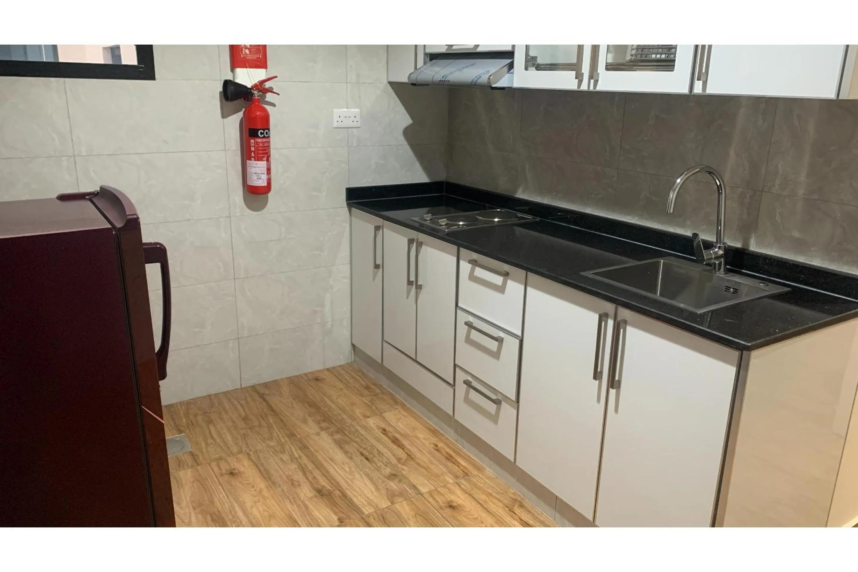 Bedroom in OYO Townhouse 156 Rose Hotel Apartments